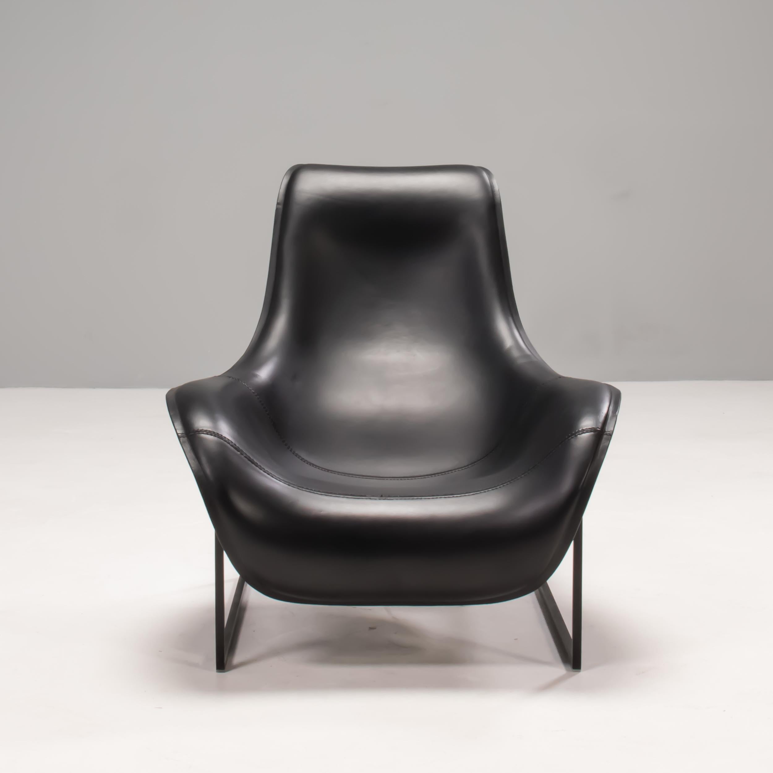 Originally designed by Antonio Citterio for B&B Italia in 2003, the Mart lounge chair is a fantastic example of modern design.

The sinuous silhouette is created through the use of shaped polyurethane foam and thermoformed leather, which gives a