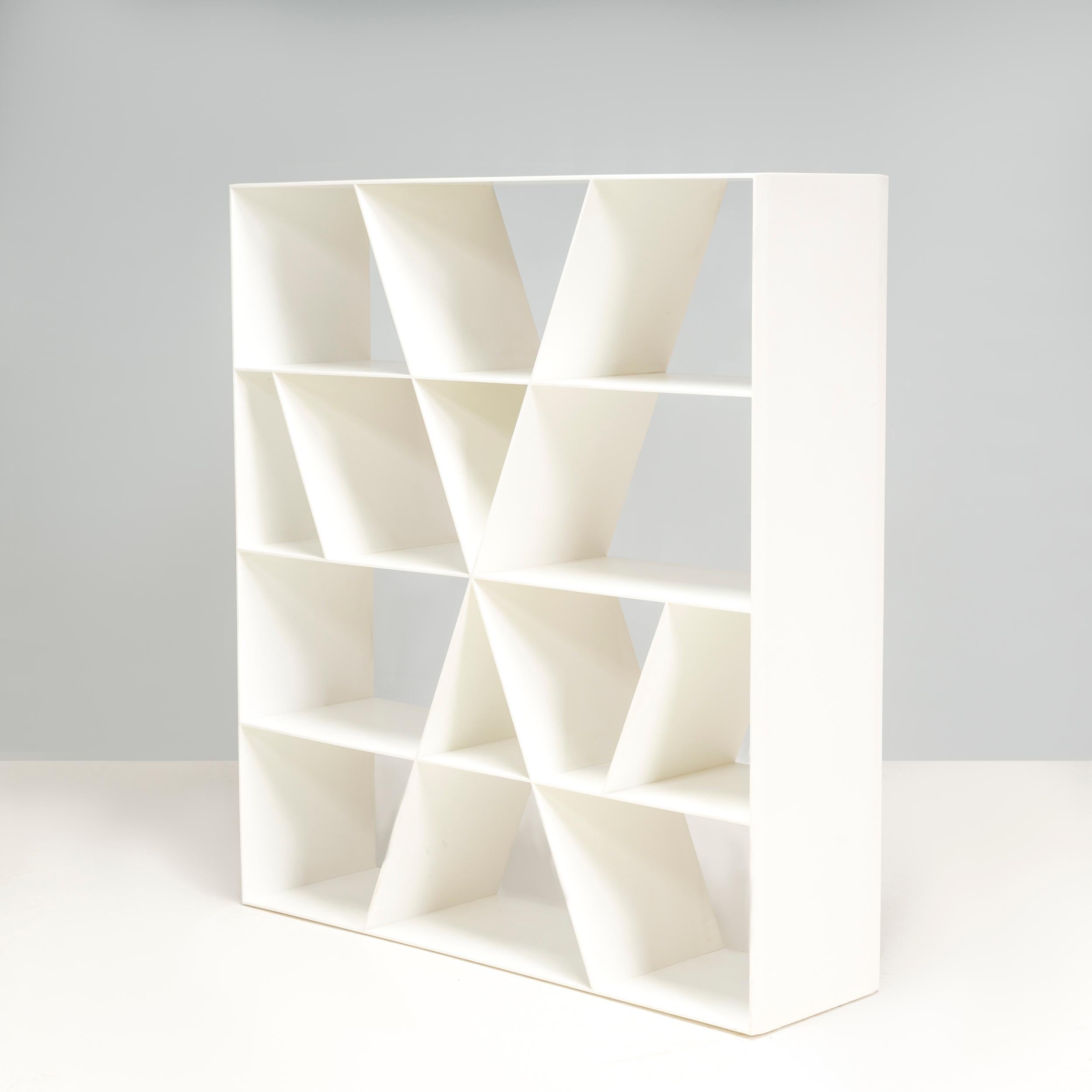 Created by Naoto Fukasawa in 2006 for B&B Italia, the 'X' shelf storage unit is composed by sloping shelves and interior panels which are characterised by numerous intersecting lines. Varnished completely in white, the elegant design will bring