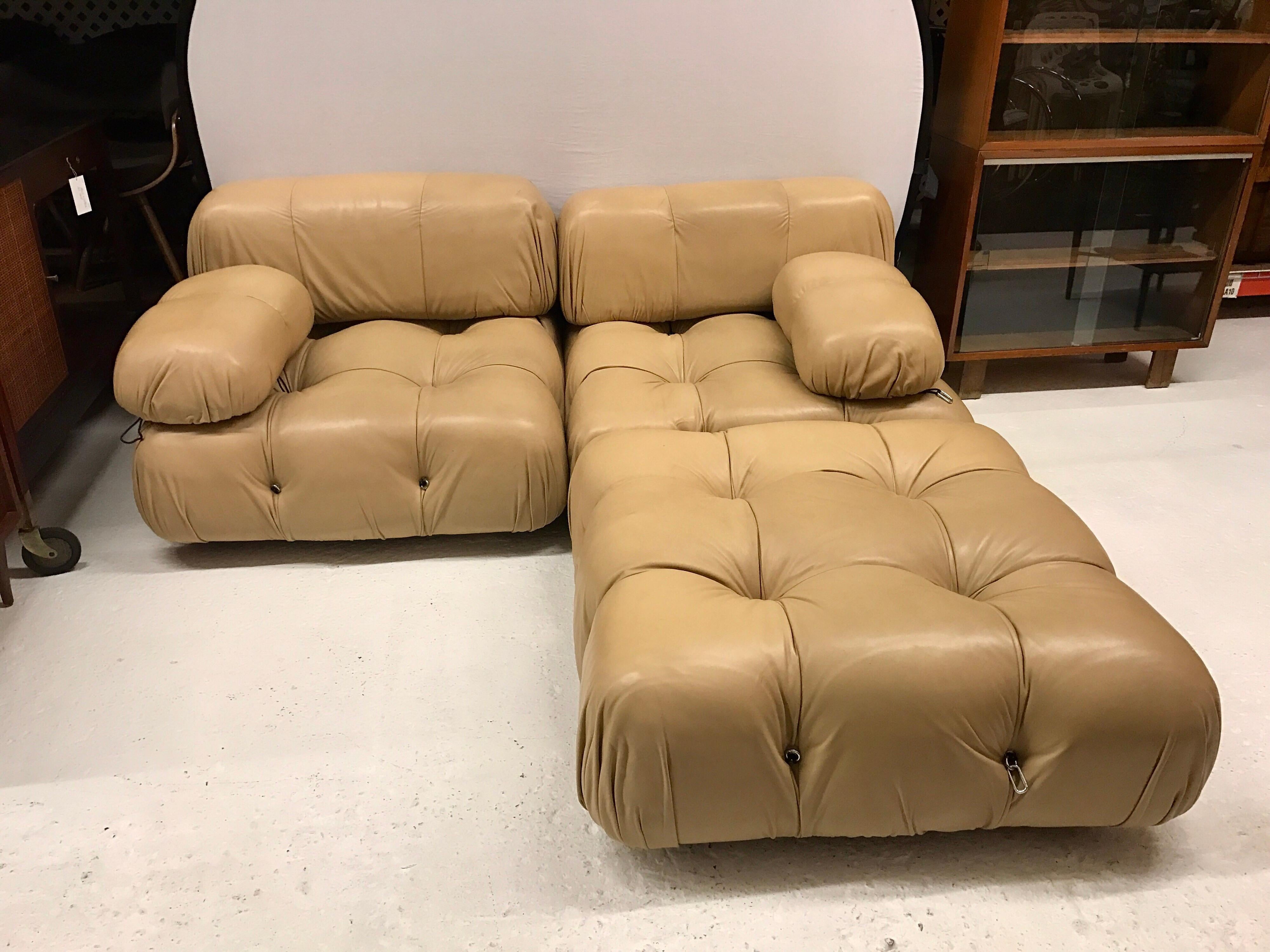 Sought after Mario Bellini, large modular Cameleonda sofa, rare solid beige leather upholstery, circa early 1970s, Italy with all manufacturer and designer hallmarks. The leather is nothing short of gorgeous.

The sectional elements this sofa was