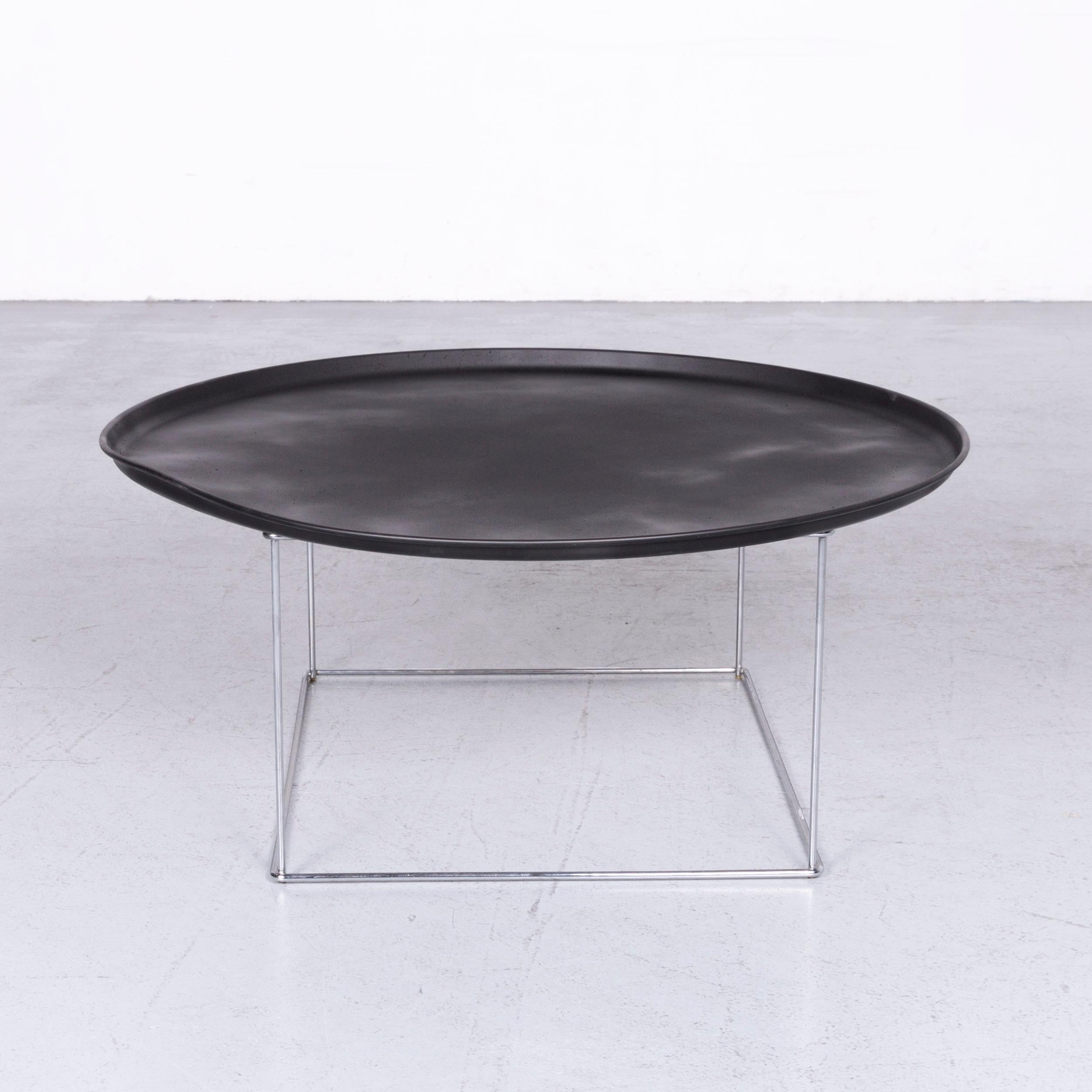 We bring to you a B&B Italia fat-fat designer table black metal coffee table.