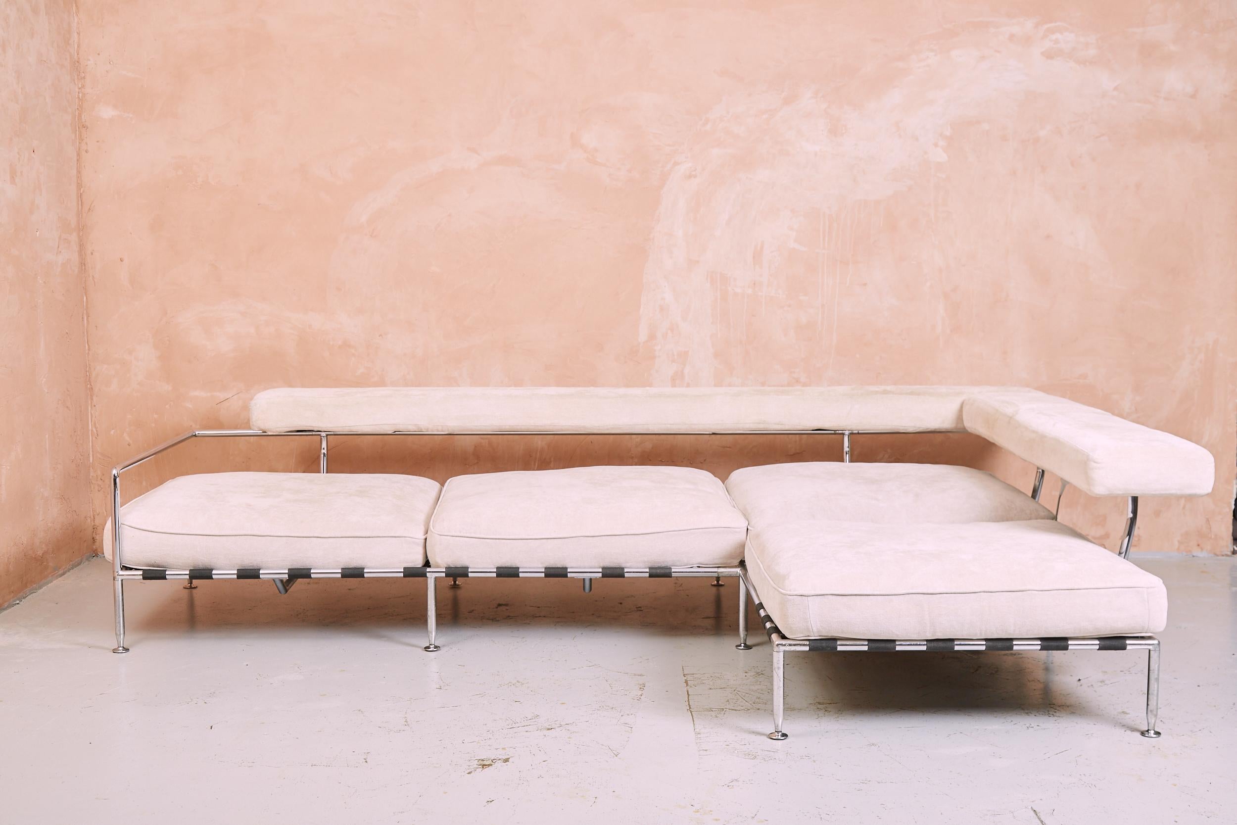 A large, extremely comfortable and versatile sofa by Antonio Citterio for B&B Italia, designed in the late 1990s. Chromed tubular steel lower frame, strap supports, loose seat cushion attach to straps via velcro. Swivelling backrest and upholstered