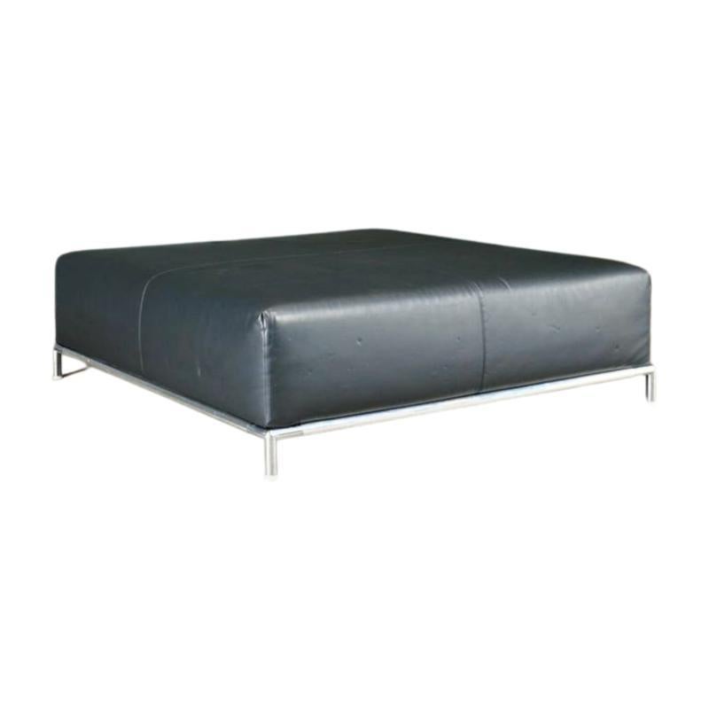 This black leather ottoman by B&B Italia, crafted in 2015, combines modern design with luxurious comfort. The high-quality leather provides a stylish and functional piece. Perfect for contemporary living spaces.
