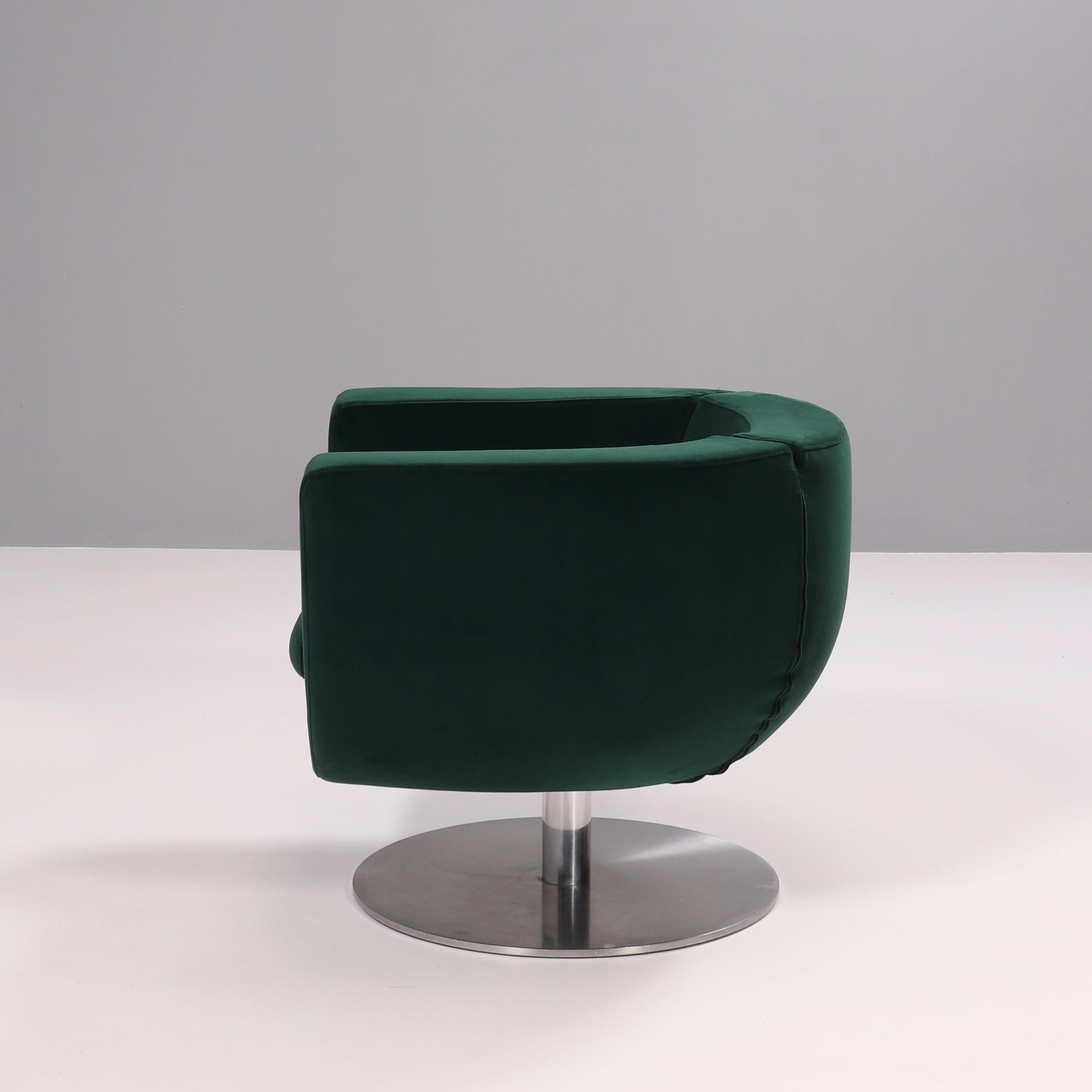 Designed by Jeffrey Bernett for B&B Italia in 2000, the Tulip armchair balances soft curves with sleek straight lines to create a timeless design.

Constructed with a tubular steel frame, the chair swivels 360 degrees on the brushed aluminium