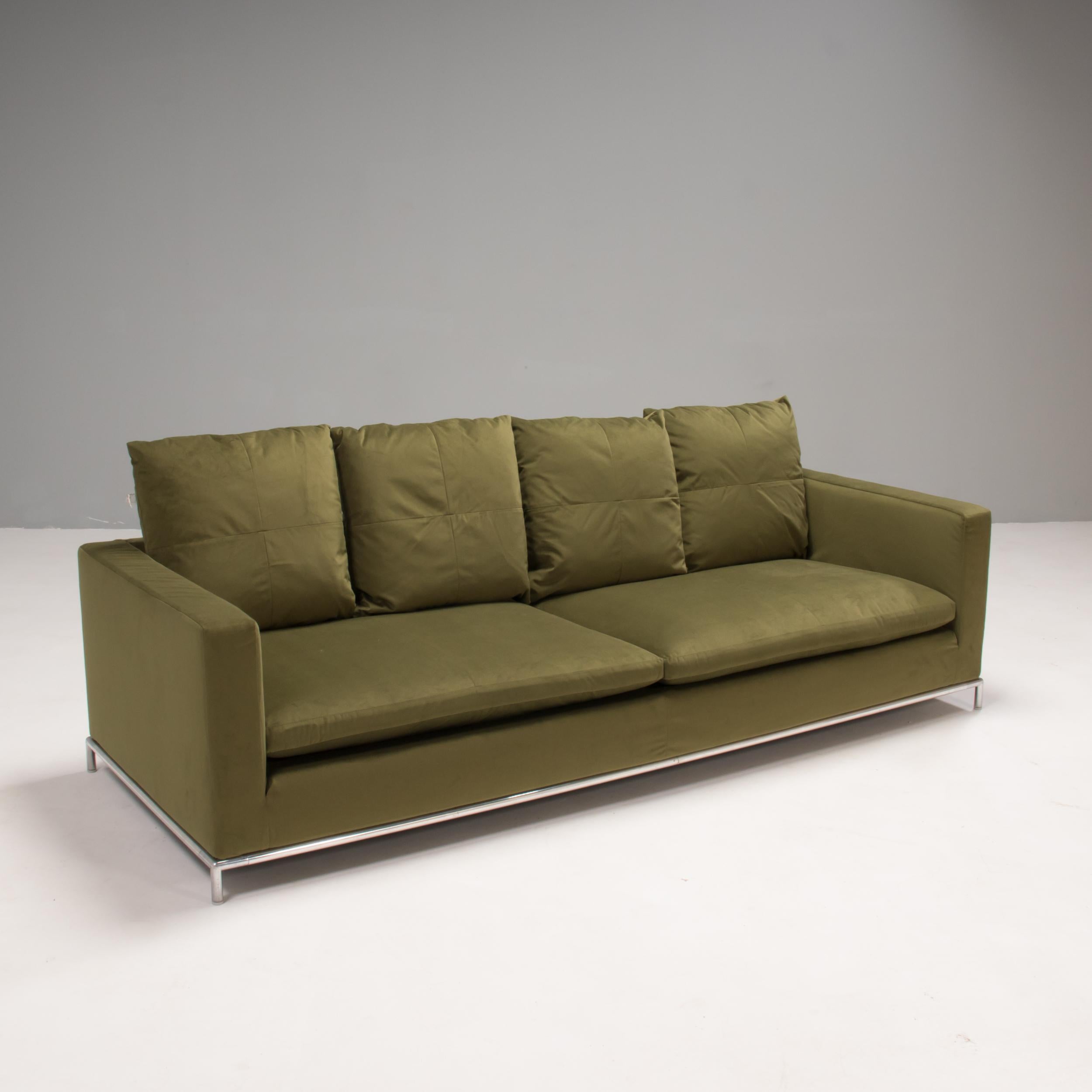 Originally designed in 2001 by Antonio Citterio for B&B Italia, this George four-seat sofa offers both comfort and style. 

The sofa features a slim tubular steel frame with protective glides and is fully upholstered in a beautiful olive green