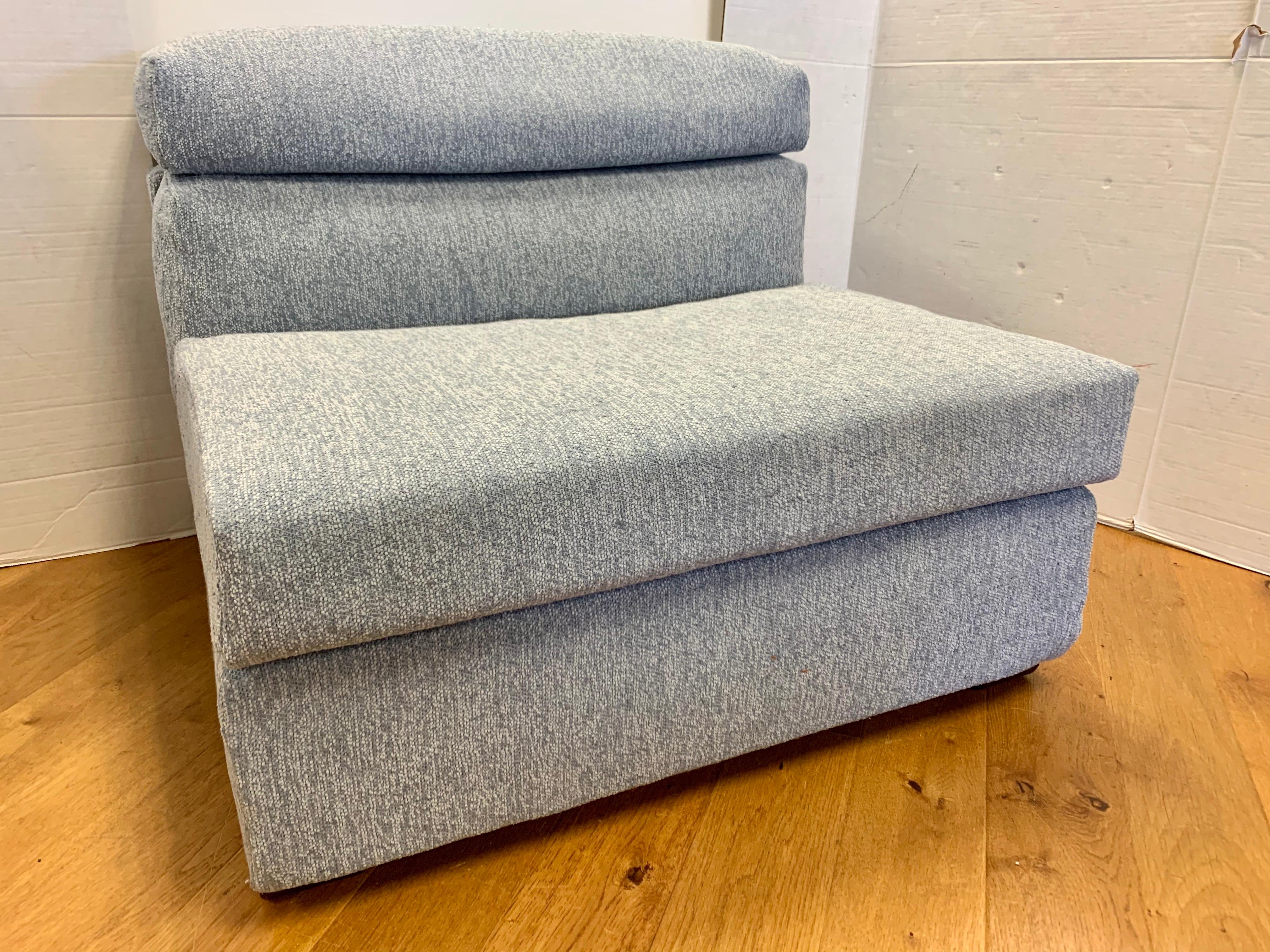 Rare B&B Italia Erasmo chair that our team of upholsterers just redid in a stunning Donghia blue and gray boucle fabric. All B&B Italia hallmarks present. One of the most comfortable lounge chairs you will ever sit in.
Looks brand new. From the