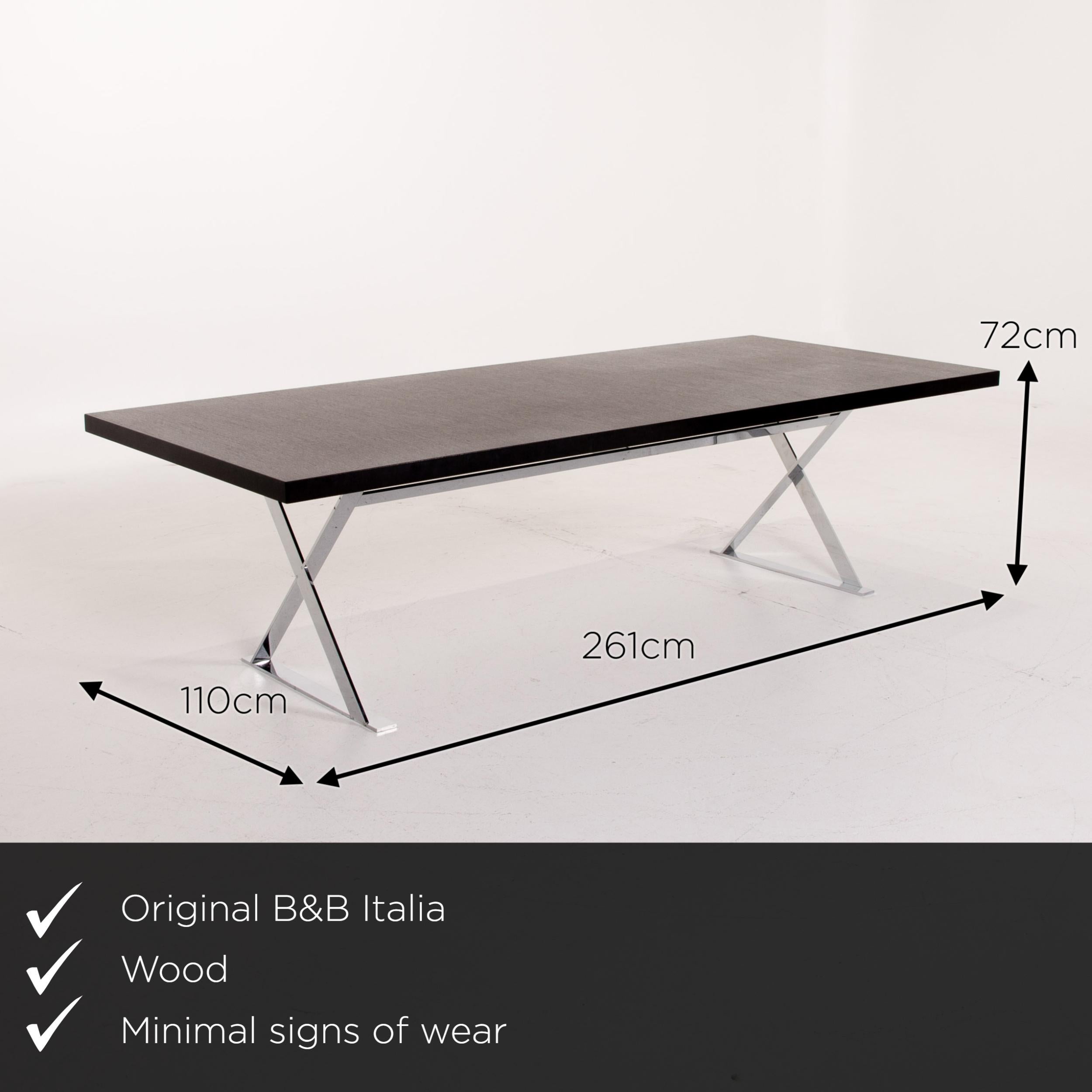 We present to you a B&B Italia max wood table black dining table steel.
   
 

 Product measurements in centimeters:
 

Depth 110
Width 261
Height 72.




   