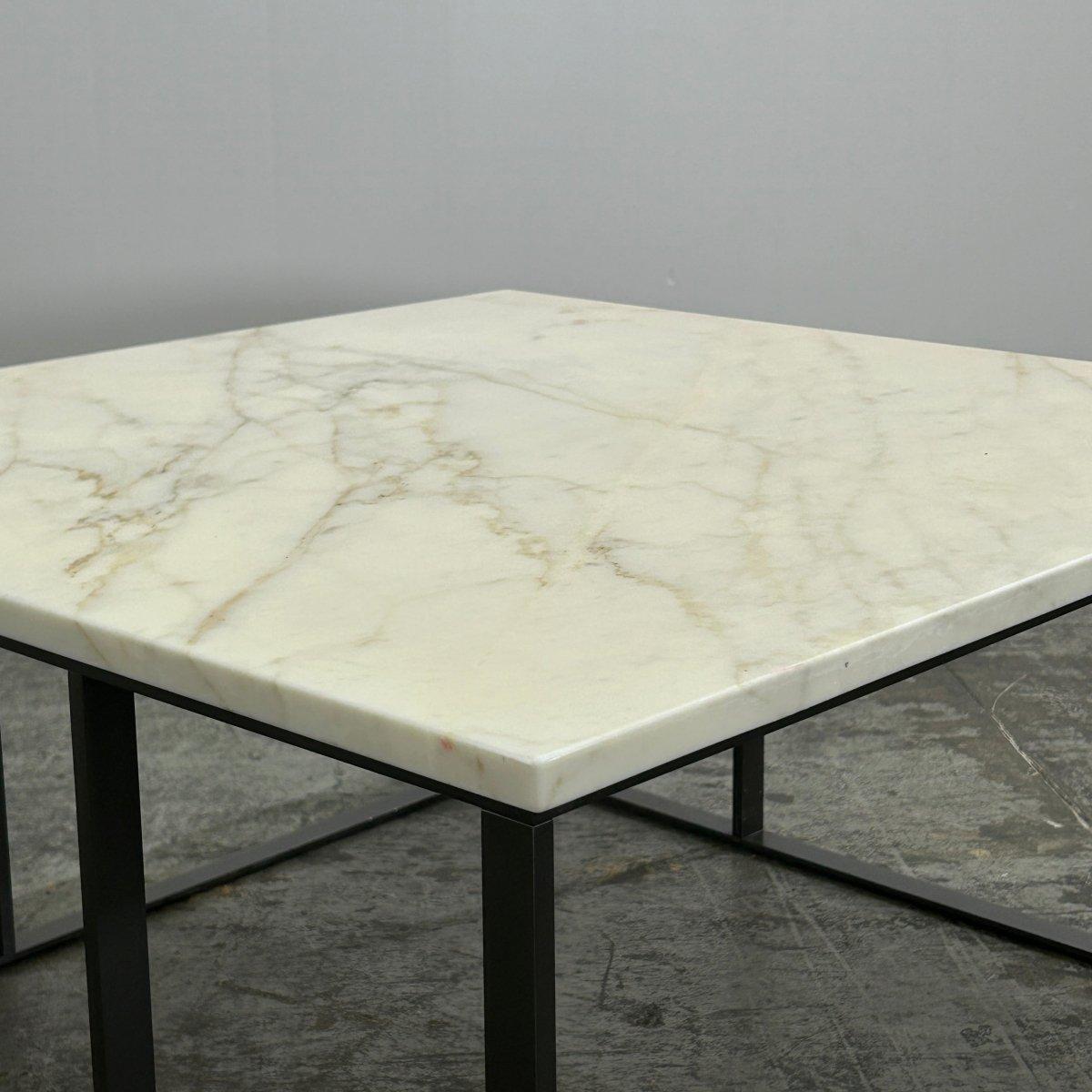 Introducing the B&B Italia Maxalto Lithos Coffee Table, a stunning piece that exudes elegance and sophistication. Crafted with the finest materials, this coffee table features a sleek and modern design, perfect for any contemporary living space. The