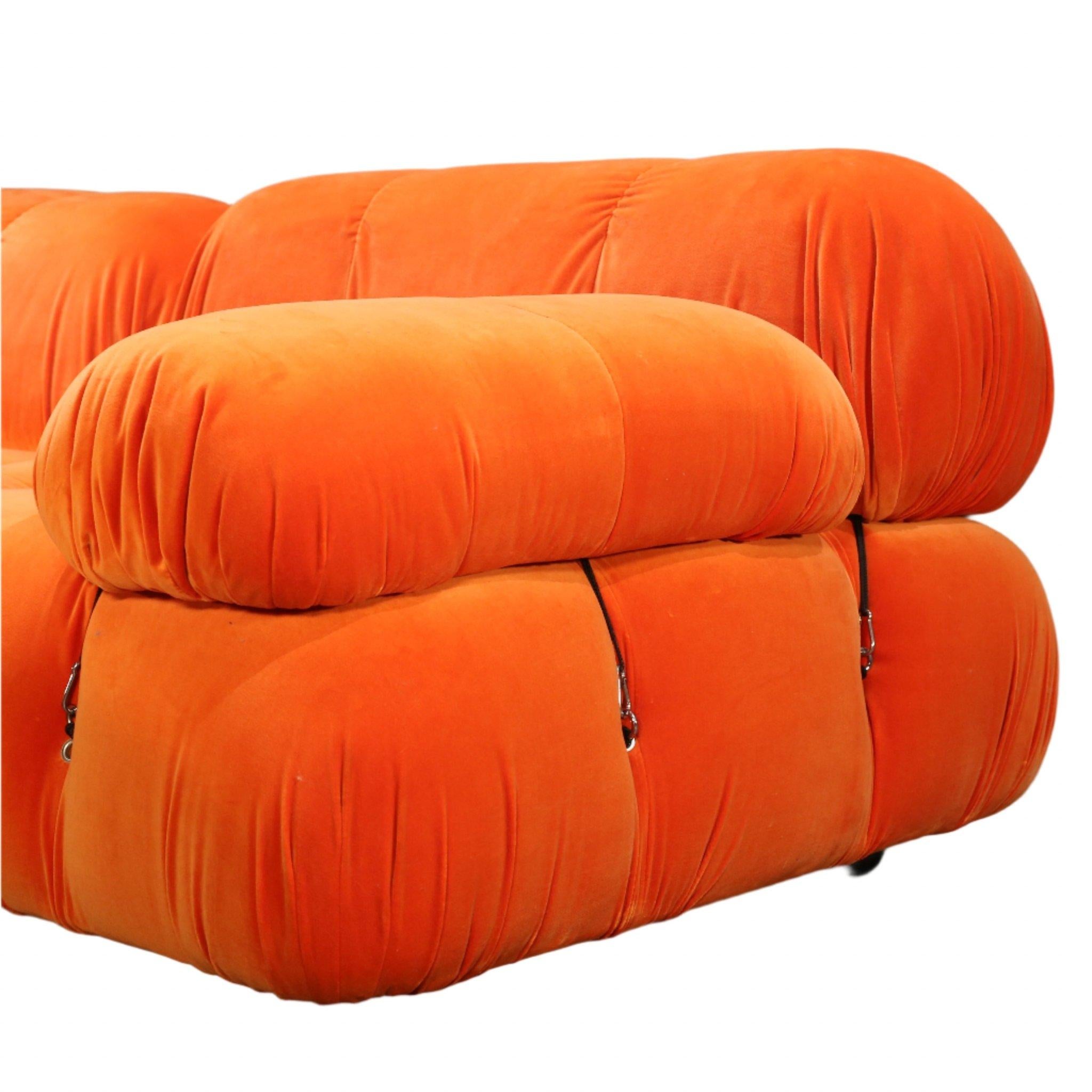 The B&B Italia Camaleonda Sofa by Mario Bellini in vibrant orange velvet is a striking blend of bold design and luxurious comfort. Renowned for its modular flexibility, the iconic Camaleonda allows you to customize its layout, making it perfect for