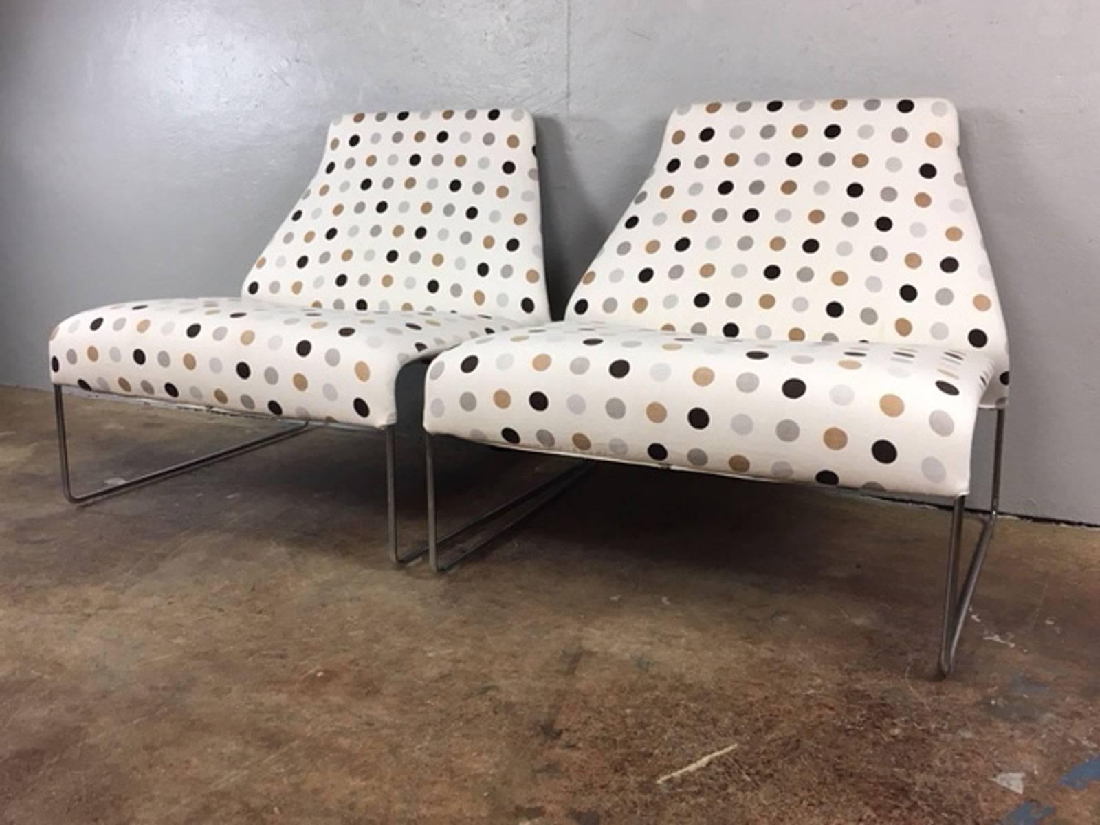 Attributed to B&B Italia. Sleek, extra wide, Mid-Century Modern sling chair in original sharp polka dot print. Fabric is in very good condition. The fabric on each seat, while in super condition, has a couple of very light surface marks. The word