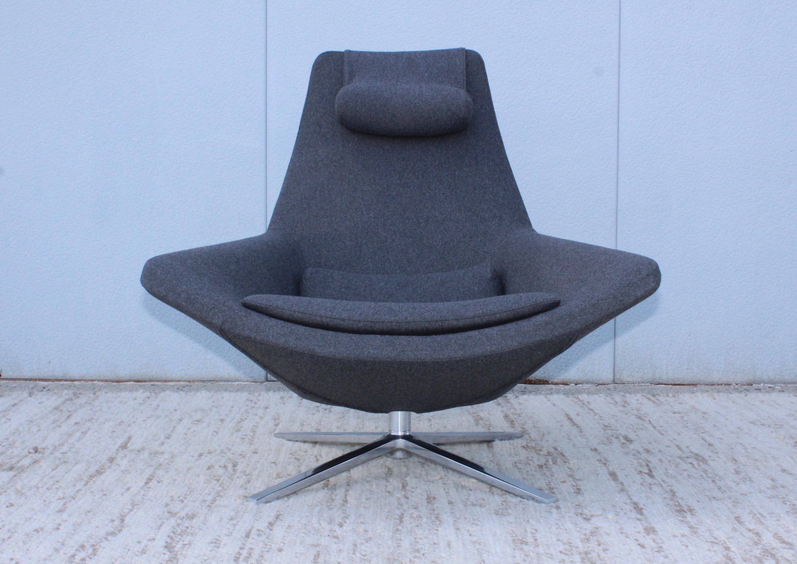 Chrome base swivel lounge chair designed by Jeffrey Bernett for B&B Italia in gray fabric.