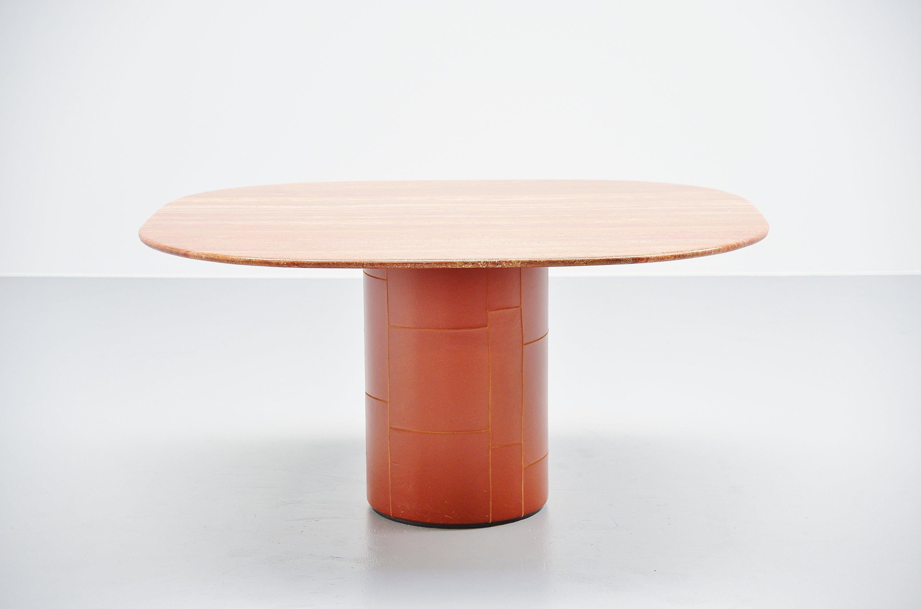 Highly decorative 'Tobio' dining or center table designed by designer duo Afra e Tobia Scarpa and manufactured by B&B Italia, Italy, 1974. The table has a wooden base with cognac leather patchwork cover and a fantastic orange red marble top which
