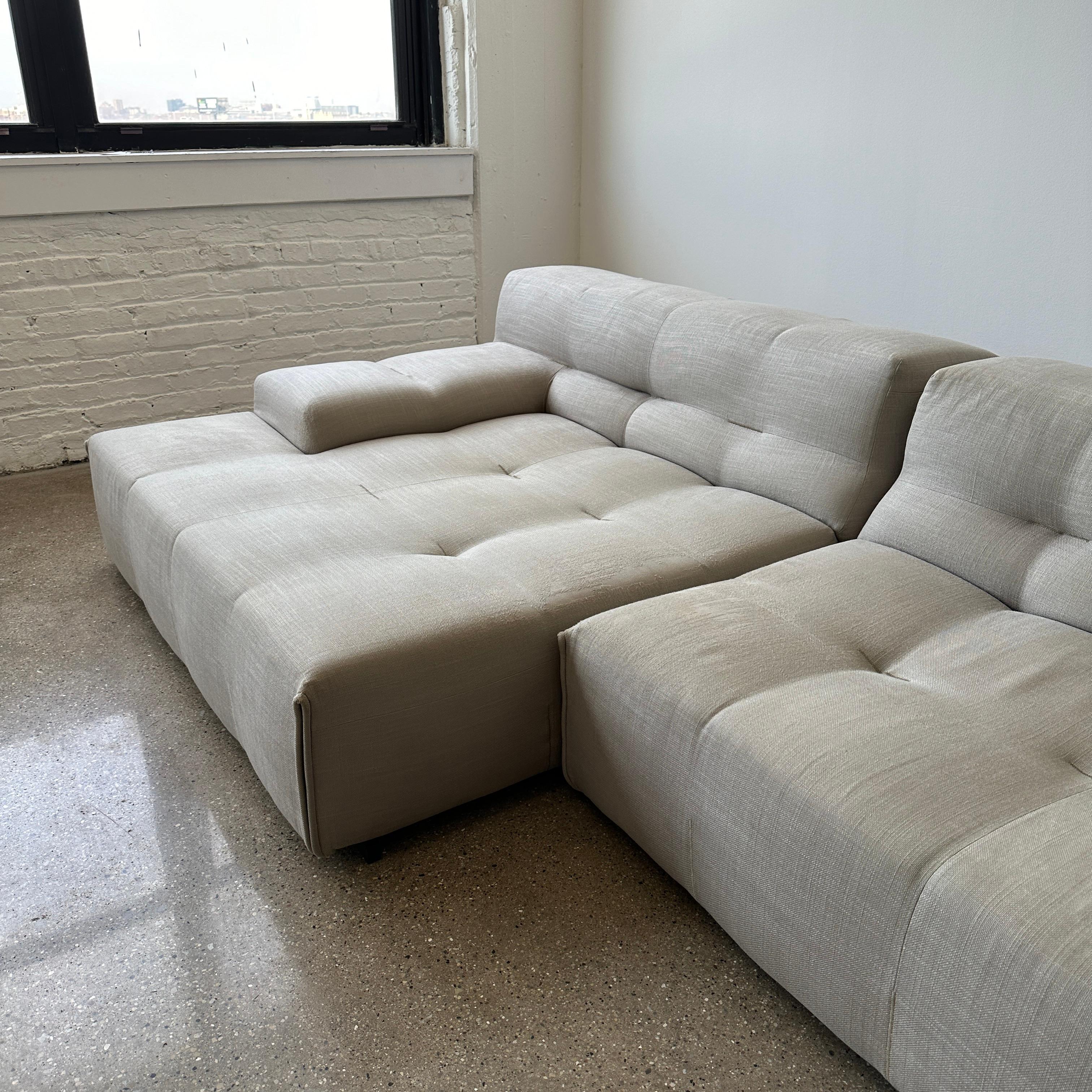 By Patricia Urquiola c. mid 2000s. There is some significant wear on the fabric so this piece is priced accordingly. However, it reads wonderfully and is incredibly comfortable. The original legs also no longer hold the sofa together so we’ve used