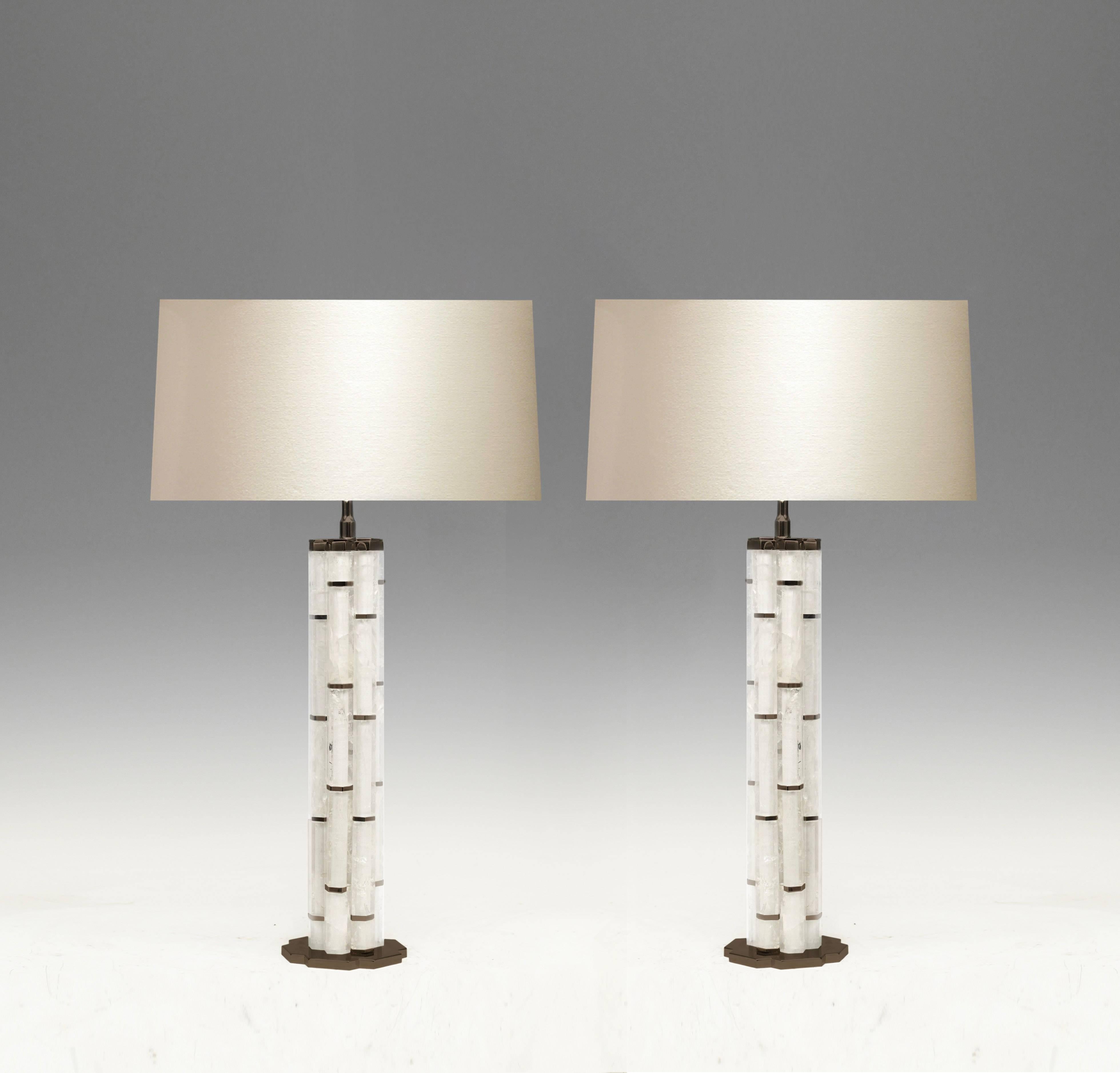 A pair of bamboo-inspired rock crystal quartz Lamps with antique bases and decorations. Created by Phoenix Gallery NYC.
17.5H to the top of rock crystal.
