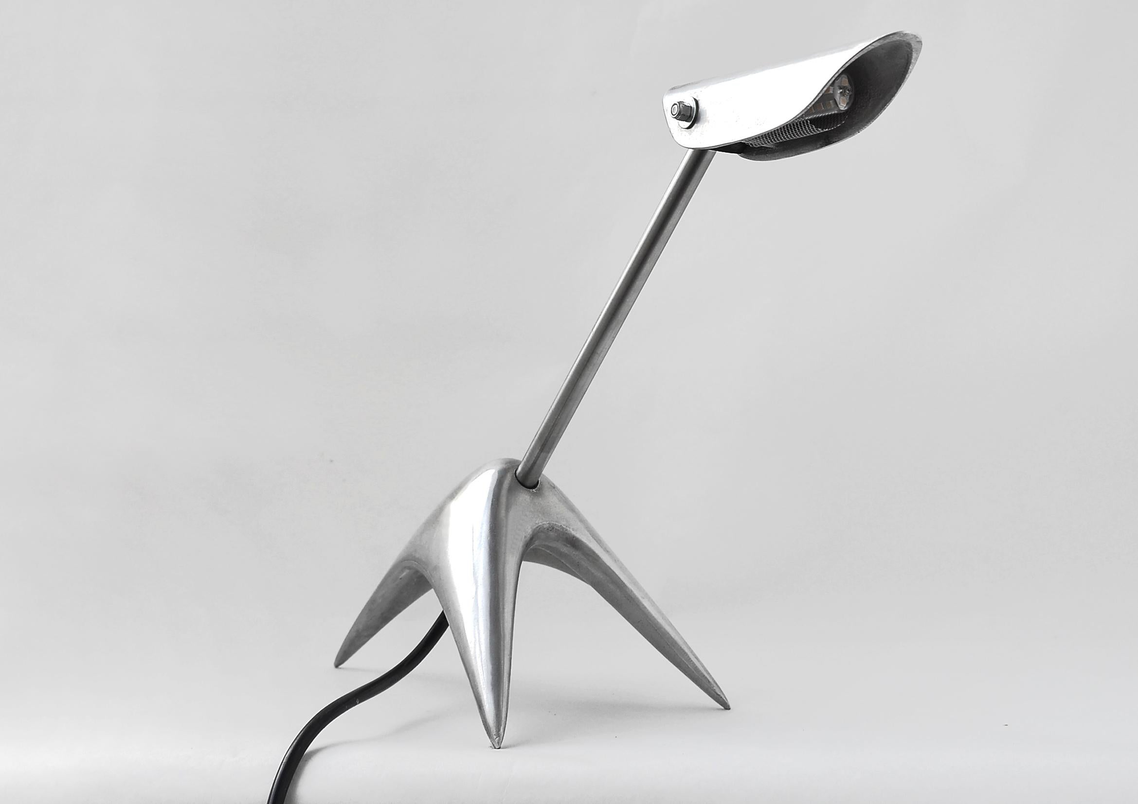 BB3Pod Desk Lamp by Lucio Rossi
Dimensions: D 20 x W 65  x H 45  cm
Material: Aluminum, Stainless steel.
Weight: 2,35kg

The BB3Pod collectible edition is a desk lamp designed for small tables and reduced spaces, with an adjustable  head that