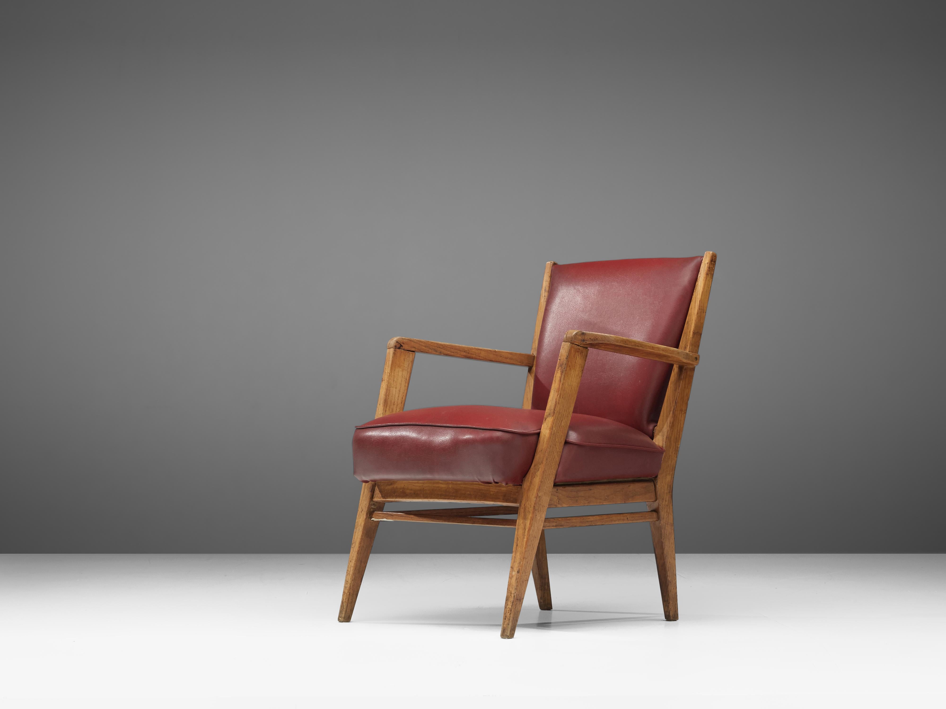 BBPR, armchair, skai leather and oak, Italy, 1950s.

This sculptural lounge chair is clearly a design by the architects of BBPR. The model with a wide seat has the characteristic, sculptural frame. The tapered and tilted legs with sharp edges are