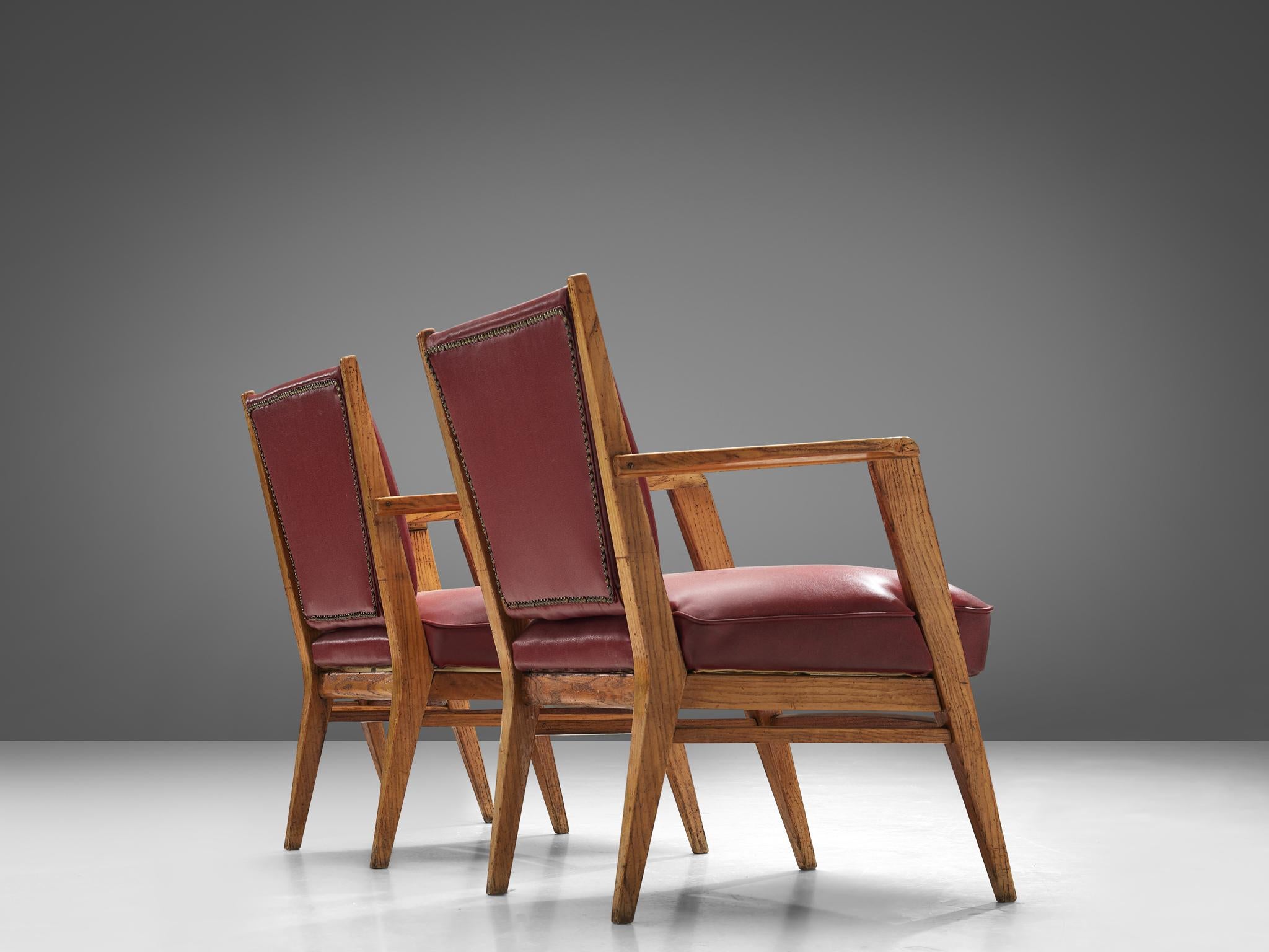 BBPR, pair of armchairs, leatherette, oak, Italy, 1950s

This sculptural pair of lounge chairs are clearly a design by the architects of BBPR. The model with a wide seat has the characteristic, sculptural frame. The tapered and tilted legs with