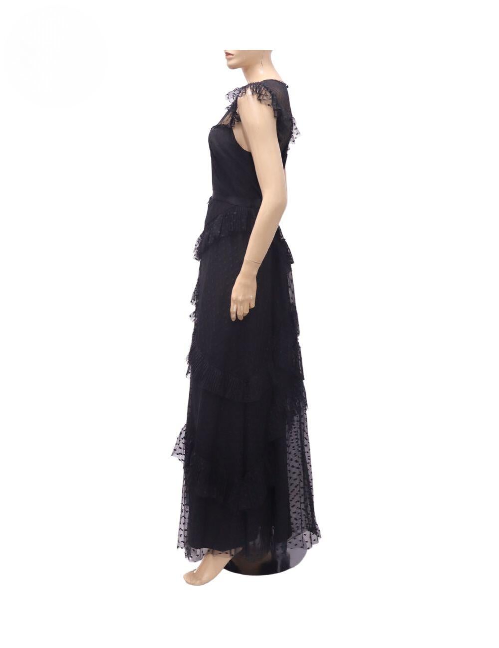 BCBG Maxazria Sweetheart Neckline Maxi Dress, Features mesh accents, polka dots and a zip closure at back.

Material: 100% Nylon
Size: US 10 / M
Bust: 95cm
Waist: 76cm
Hip: 102
Overall Condition: Excellent