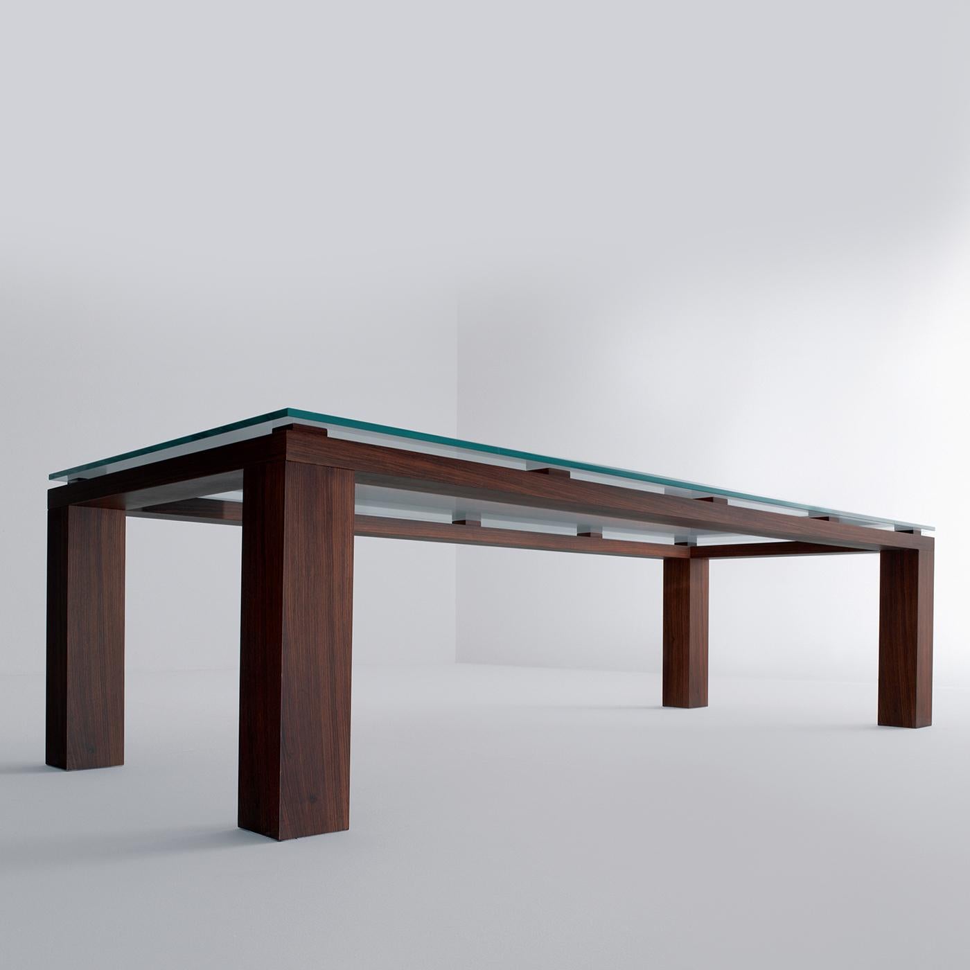 A beautifully modern design characterizes the BD 01 Rectangular Table by Bartoli Design. With a rosewood structure and crystal glass top, this table can be made in other wood types from the sample book or in brushed matt lacquer in all RAL colors.