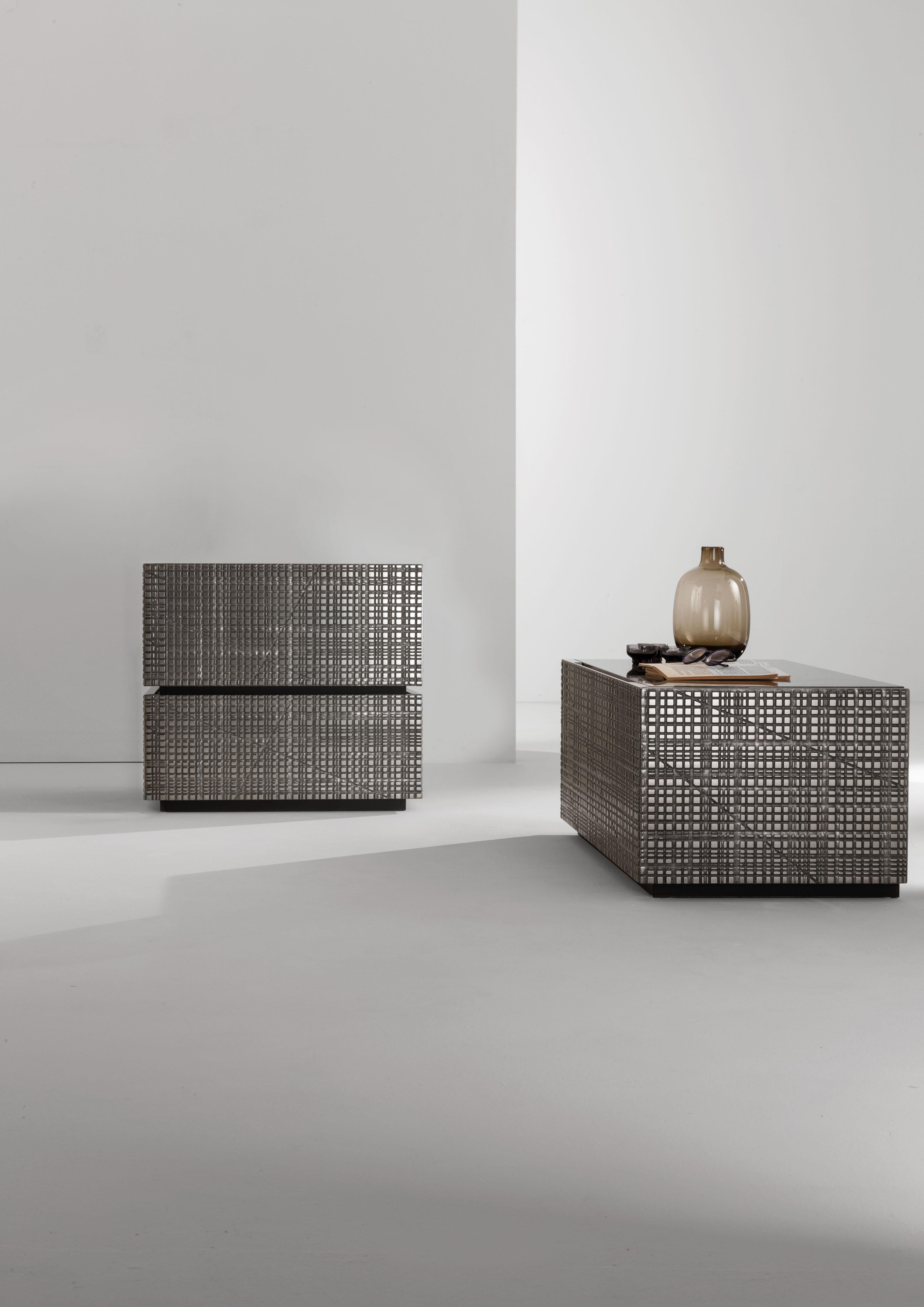 BD 06 Bed Side Table by Laurameroni
Dimensions: W 60 x D 45 x H 55 cm
Materials: Wood, Metal, Marble.

Wooden bedside table with Maxima carved drawers and structure covered in liquid metal tin. Top in 