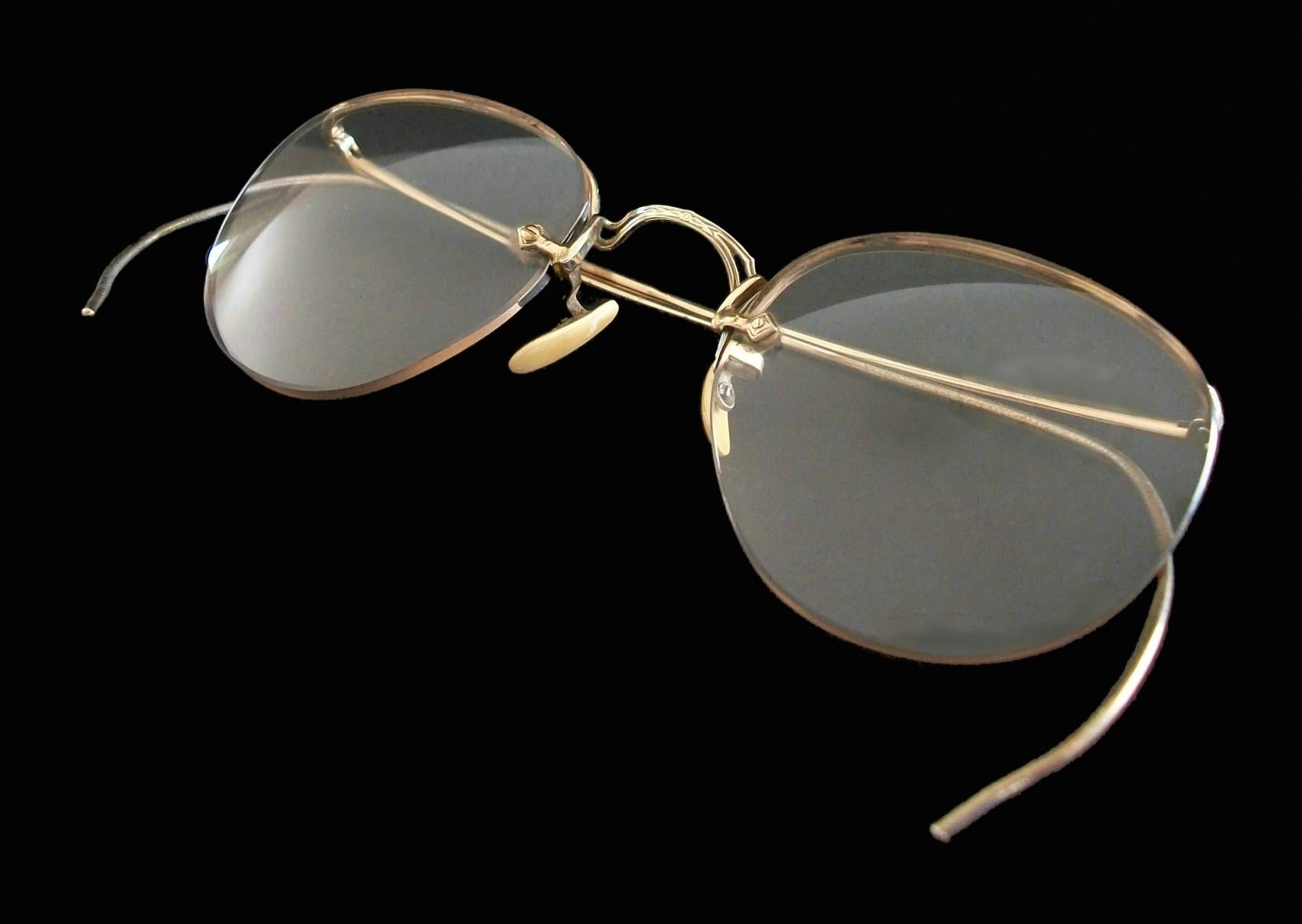 BDG - vintage 10k yellow gold child's eyeglasses - featuring rimless prescription lenses - Fine quality frames with Edwardian details - signed 10K BDG (unknown / unidentified maker - see photos) - original retail mailing box with postal date stamp