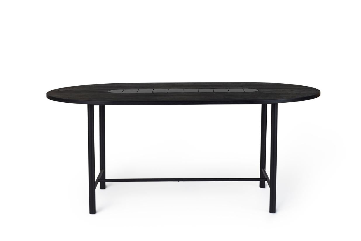 Be My Guest dining table 180 Black Oak Soft Black Tiles by Warm Nordic
Dimensions: D180 x W100 x H73 cm
Material: Black oiled solid oak, Soft black tiles, Black noir powder coated steel Frame
Weight: 30 kg
Also available in different colors and