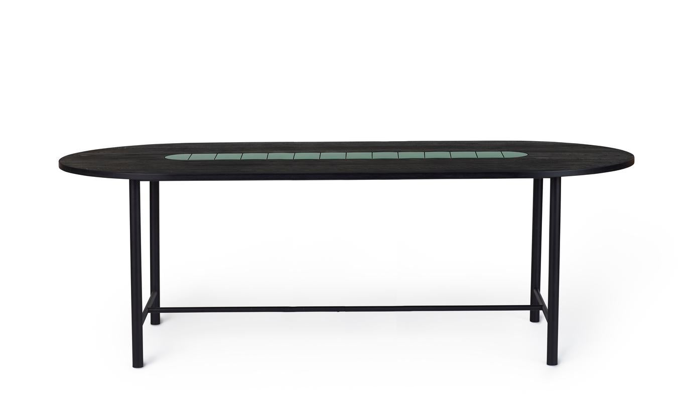 Be My Guest Dining Table 240 Black Oak Forrest Green by Warm Nordic
Dimensions: D220 x W100 x H73 cm
Material: Black oiled solid oak, Forrest green tiles, Black noir powder coated steel Frame
Weight: 32 kg
Also available in different colours and