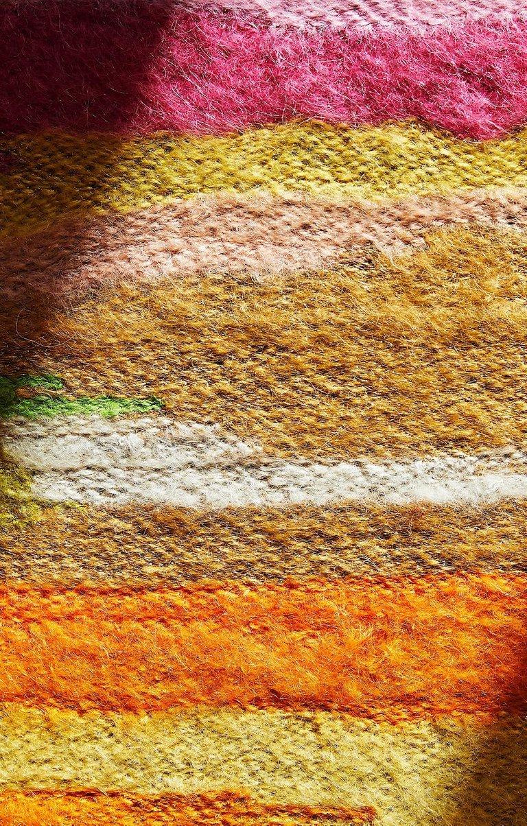 Colourful wall panel embroidered with mohair wool all-over, stretched on a canvas, leaving two raw edges on the vertical side.
   