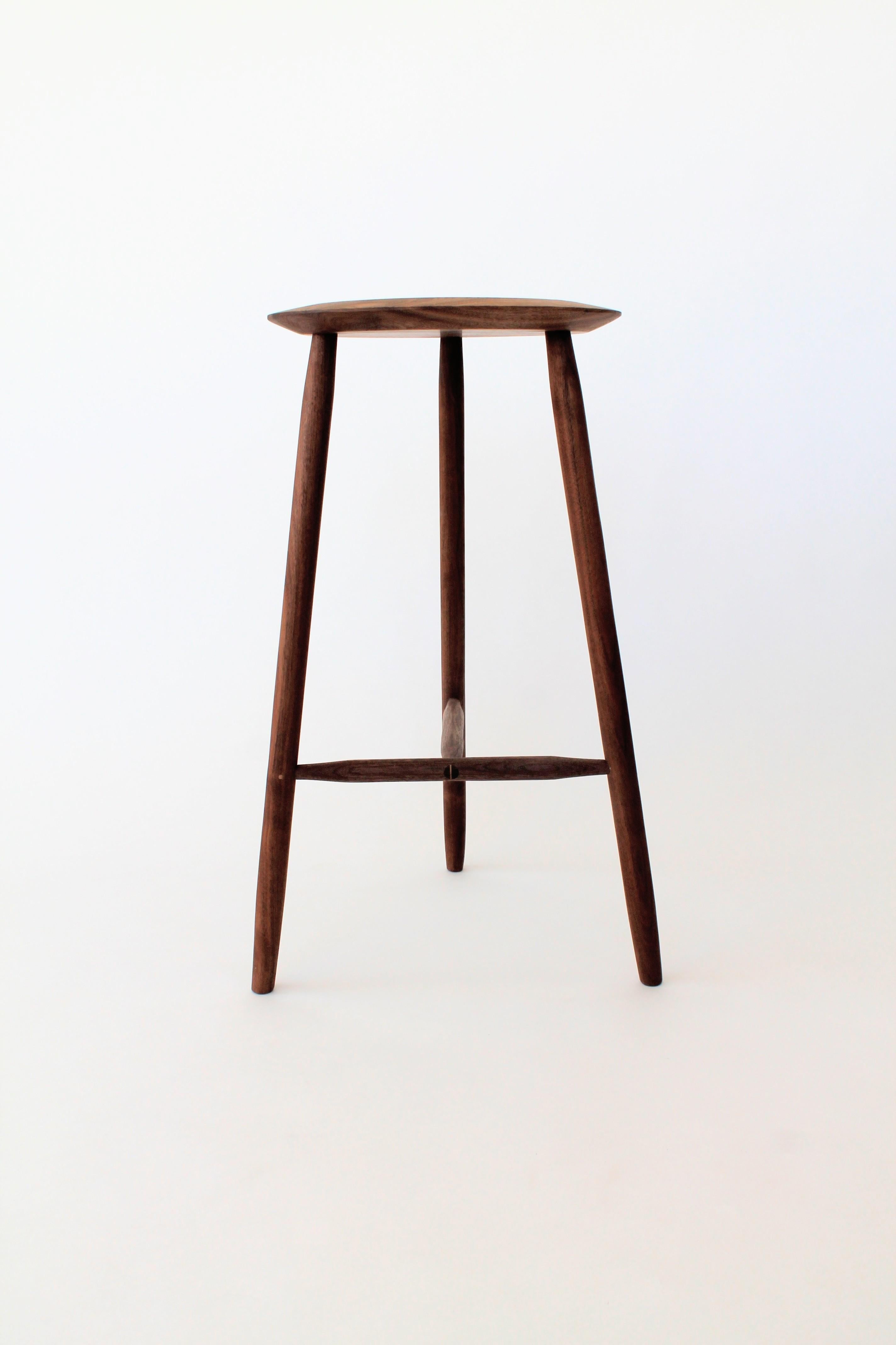 Light and strong, the Beachcomber bar stool evokes the sight of an old wooden monohull; it's lean, sturdy mast together with the rigging worthy of the high seas. Constructed of hand shaped legs and stretchers, each piece is carefully fit and pinned