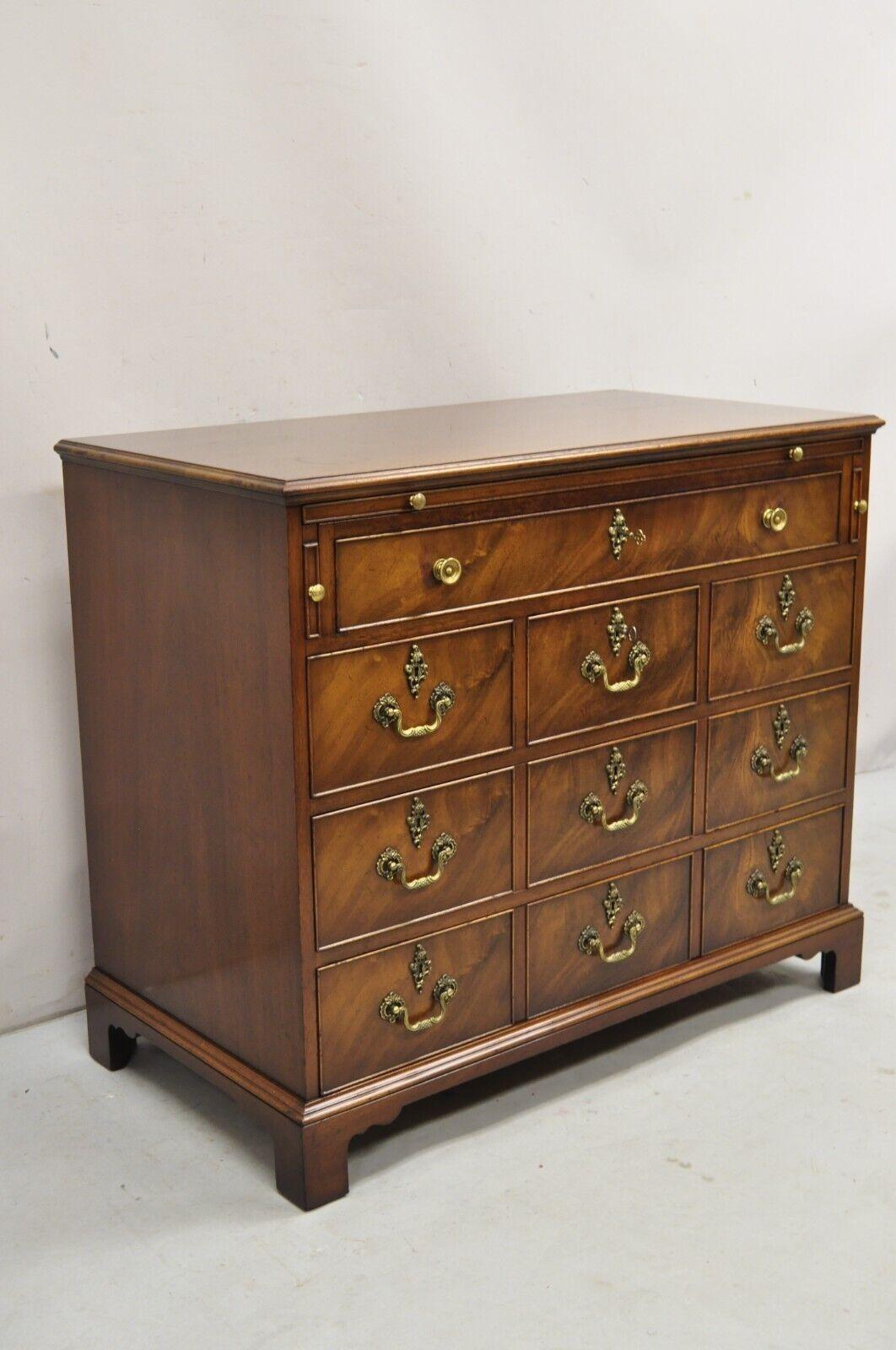 Beacon Hill Georgian Style Mahogany Commode Bachelor Chest of Drawers Server. Item features  6 drawers, pull out surface, working locks and key, solid brass hardware, original label. Circa Early 20th Century. Measurements: 31.5