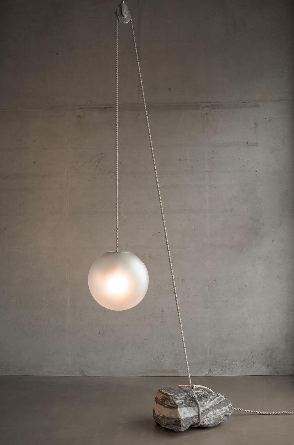 Organic Modern Dutch Beacon of Light D40 Glass Ball Sculptural Natural Stone Pendant Floor Lamp For Sale