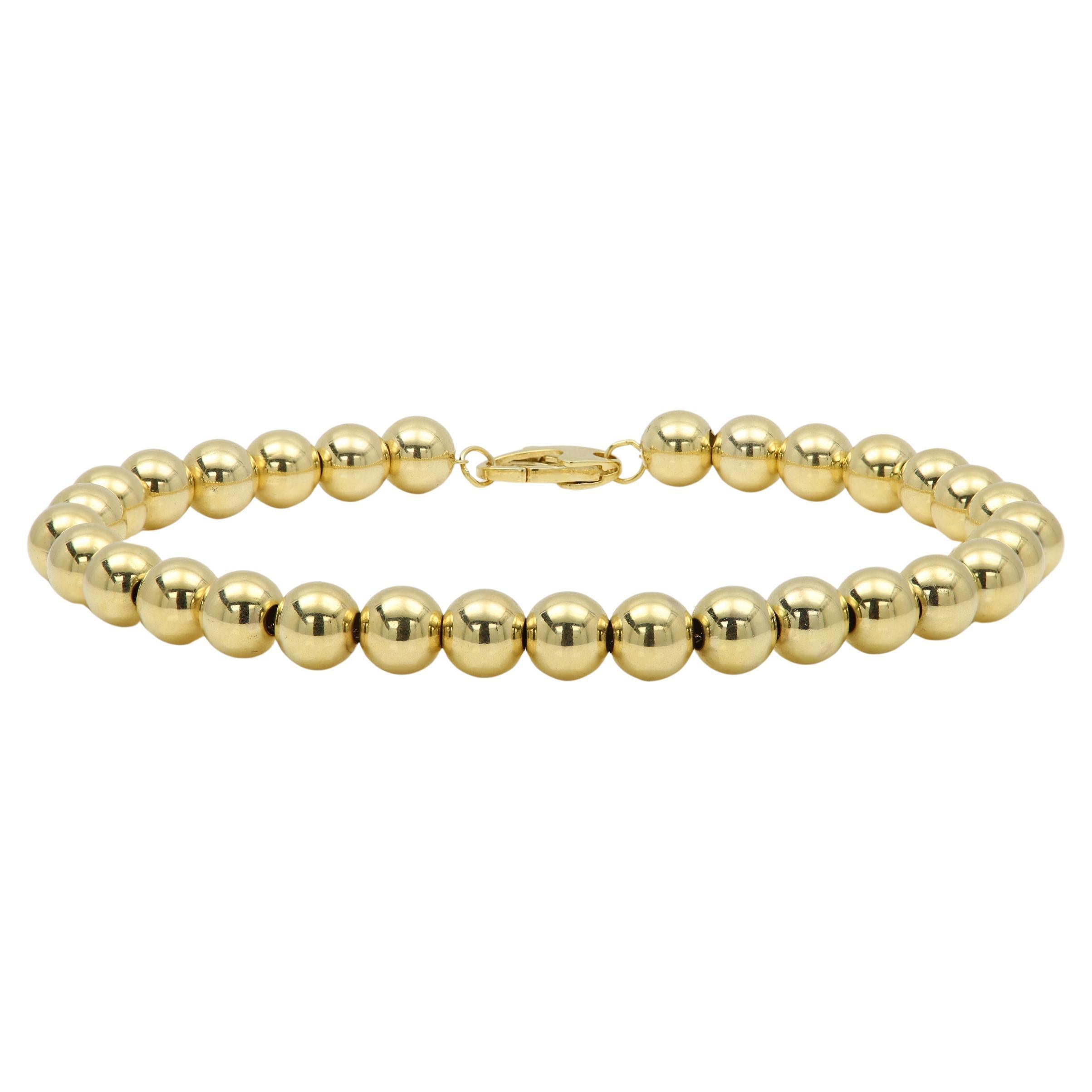 Bracciale a catena Ball and Ball Made in Italy in oro giallo 14 carati con perline da 6 mm