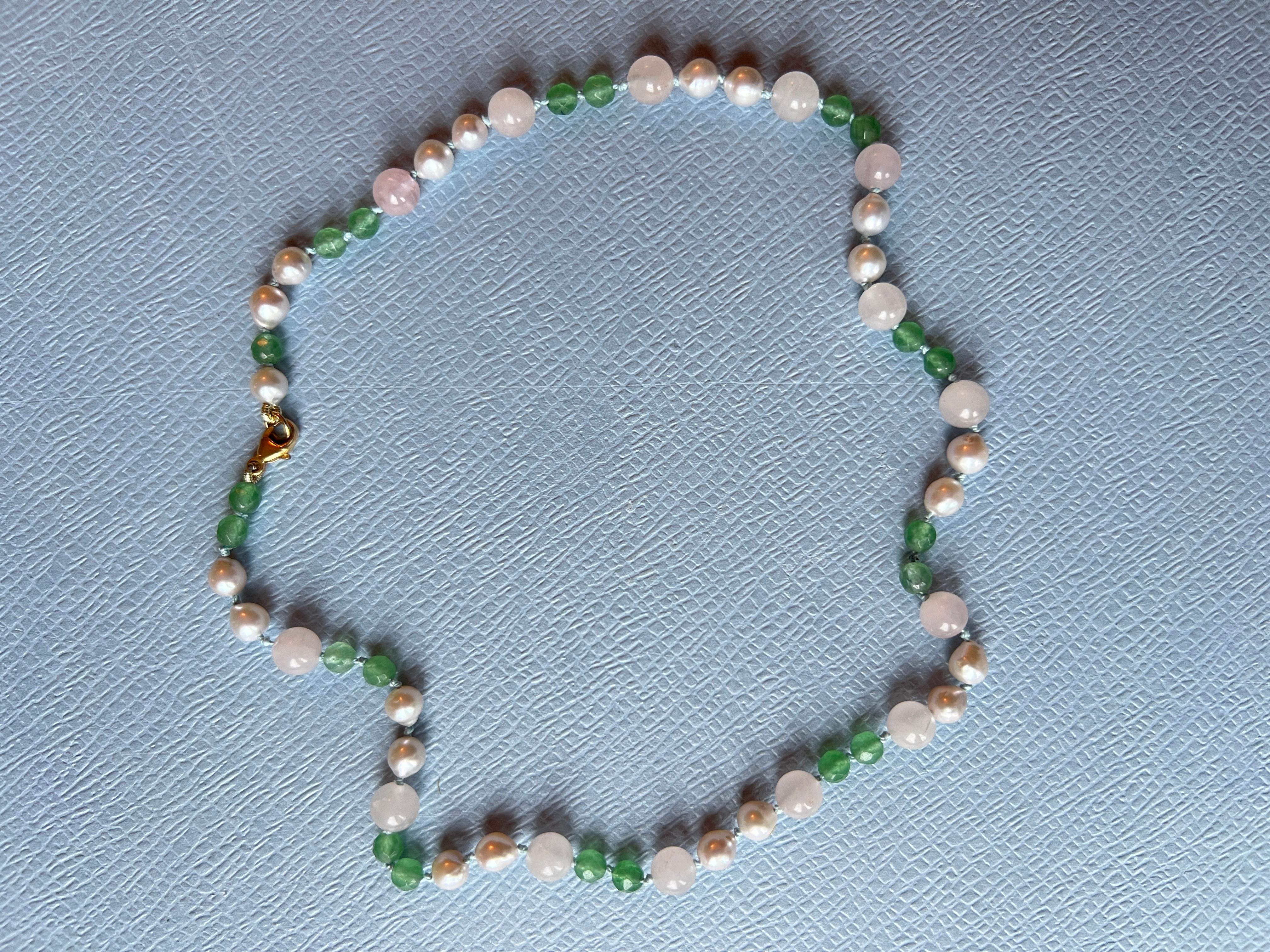 Pearl Bead Choker Necklace

Bead Choker Pearl Rose Quartz Chrysophrase 

Gold Filled Clasp

Designer J Dauphin

he Multi-Color Pearl Choker Necklace features an ensemble of pearls, rose quartz, and chrysoprase, each embedded with rich symbolic