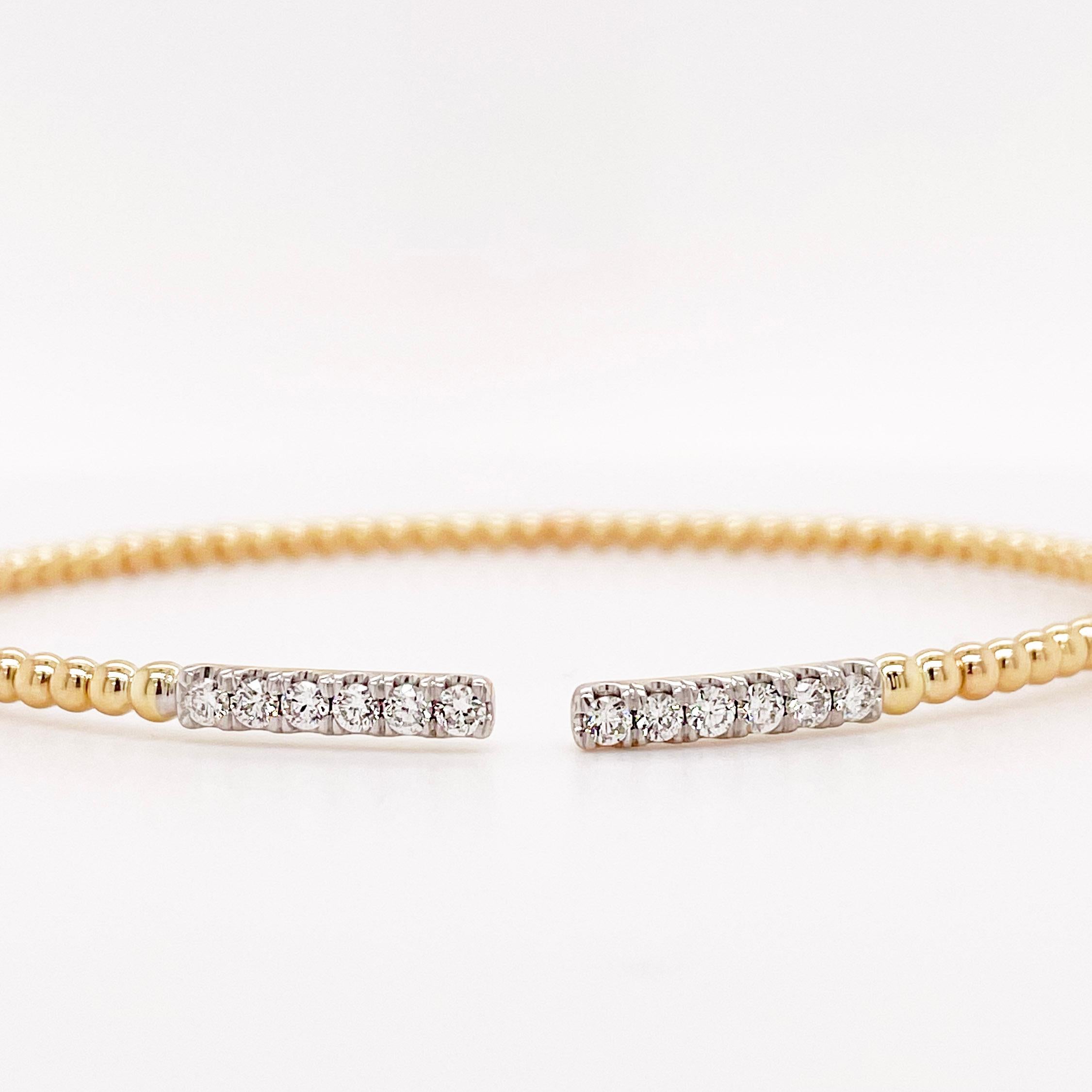 This stunning beaded cuff bracelet with a diamond pave bar is the perfect band to compliment any look. Its timeless design and flexibility make it a great cuff to wear alone or stacked with other bracelets. Its mixed metal look makes it versatile to