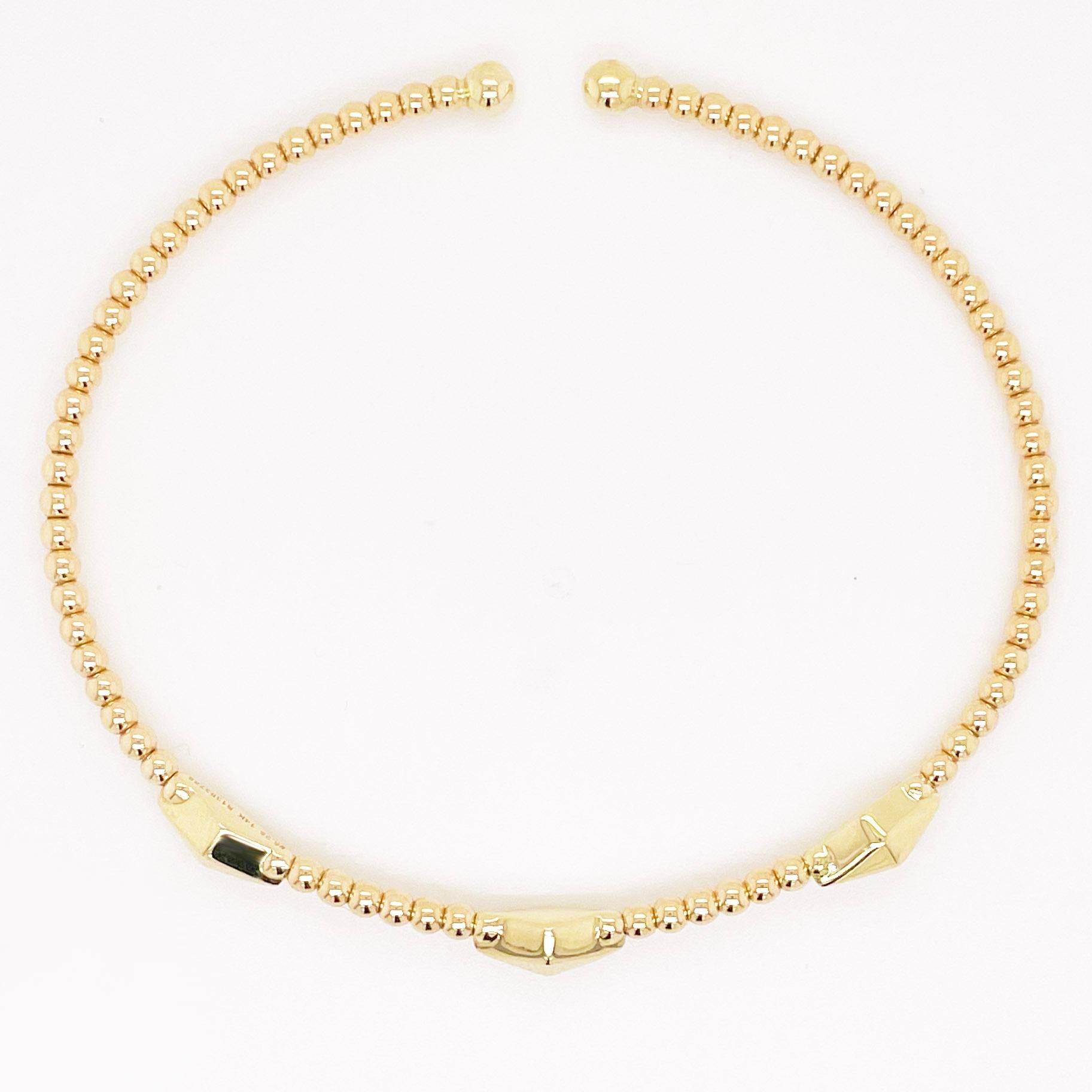 The details for this gorgeous bracelet are listed below:

Bracelet Type: Bangle, Cuff
Metal Quality: 14K Yellow Gold
Length: 6 cm (available in 3 sizes)
Width: 2.19 - 4.12 millimeters
Clasp: Flexible Bangle
Bangle Size: 6.25