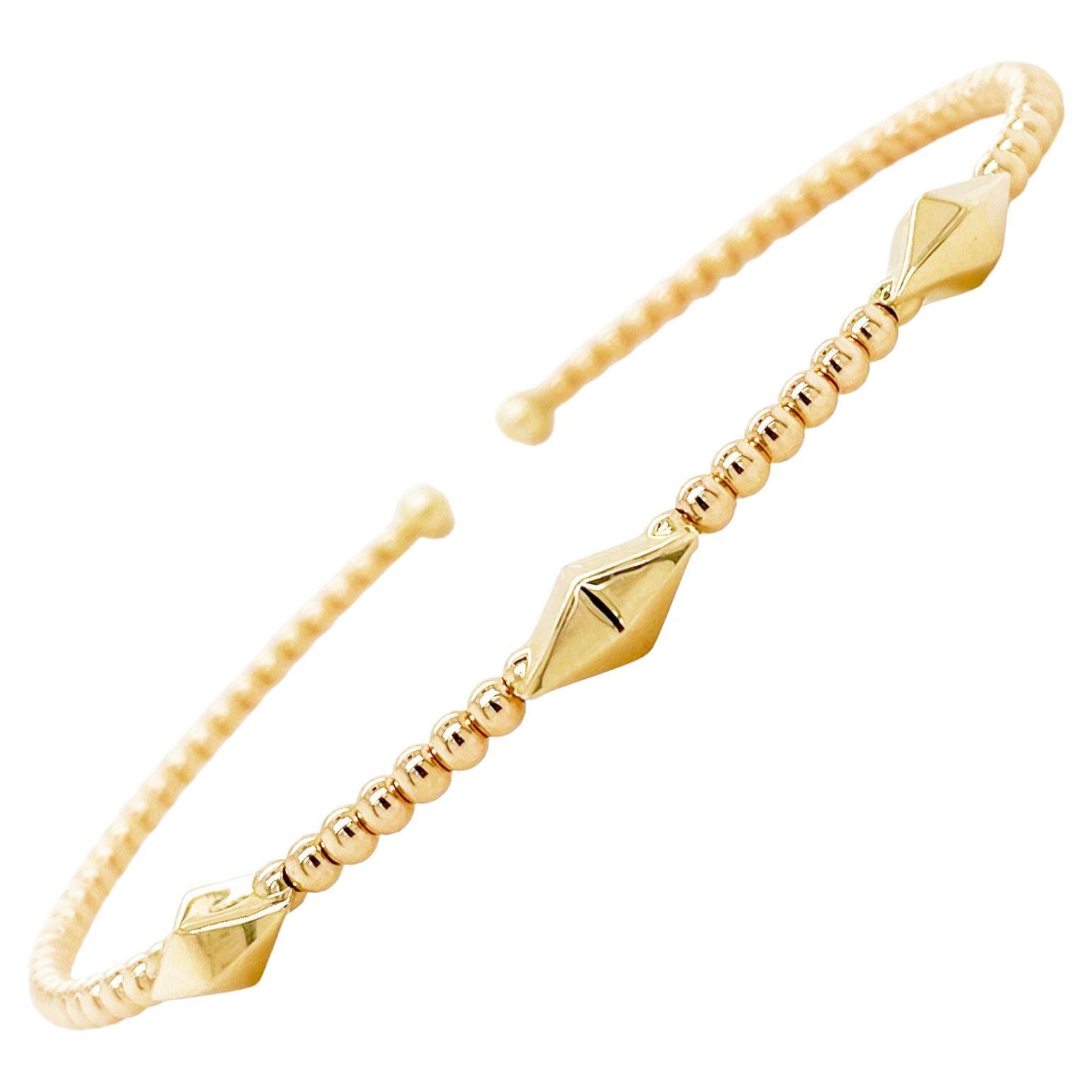 Perlen-Manschettenarmband mit Pyramiden Stations, Gelbgold, stapelbarer flexibler Armreif