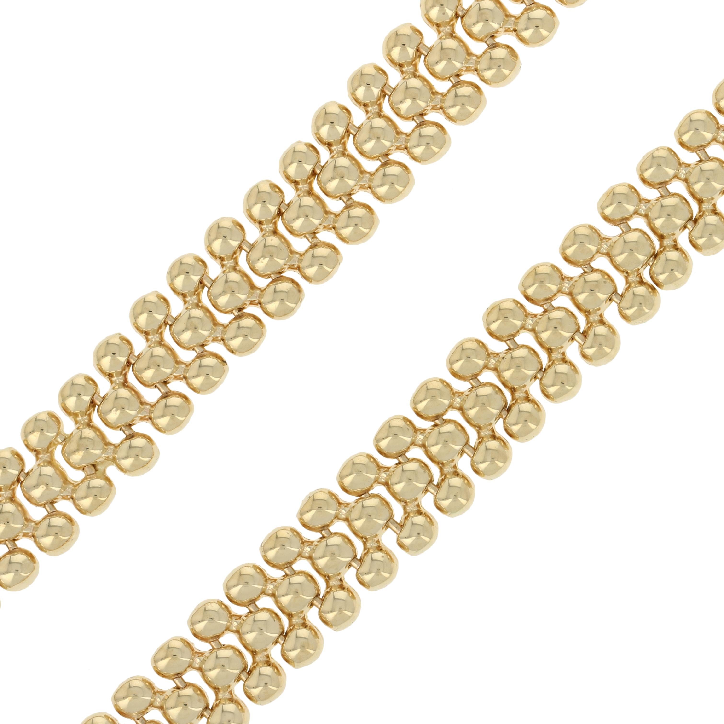 Chic sophistication defined! Exquisitely crafted in Italy, this 14k yellow gold link necklace displays a popcorn chain-inspired polished bead design that shines brilliantly from every angle for a stunning presentation.   

Country of Origin: