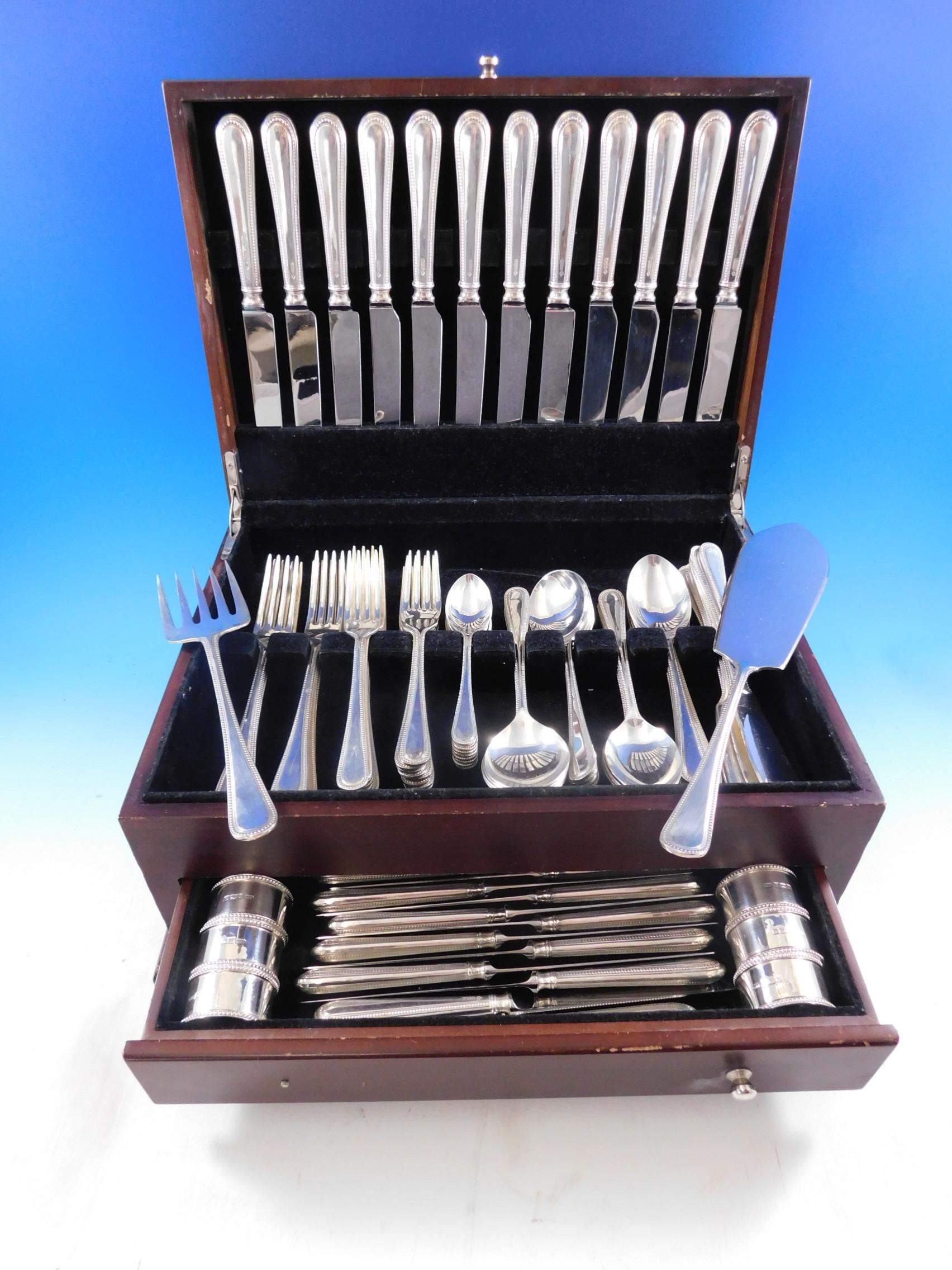 Outstanding bead - round by Carrs - Sheffield England sterling silver flatware set - 87 pieces. This set includes:


12 dinner knives, 9 3/4