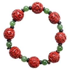 Pulsera elástica antigua de cinabrio, jade nefrita y madera de agar rara