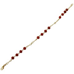 Beaded Coral Bracelet with 18 Karat Yellow Gold Chain