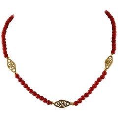 Beaded Coral Necklace and 18 Karat Yellow Gold Decorations