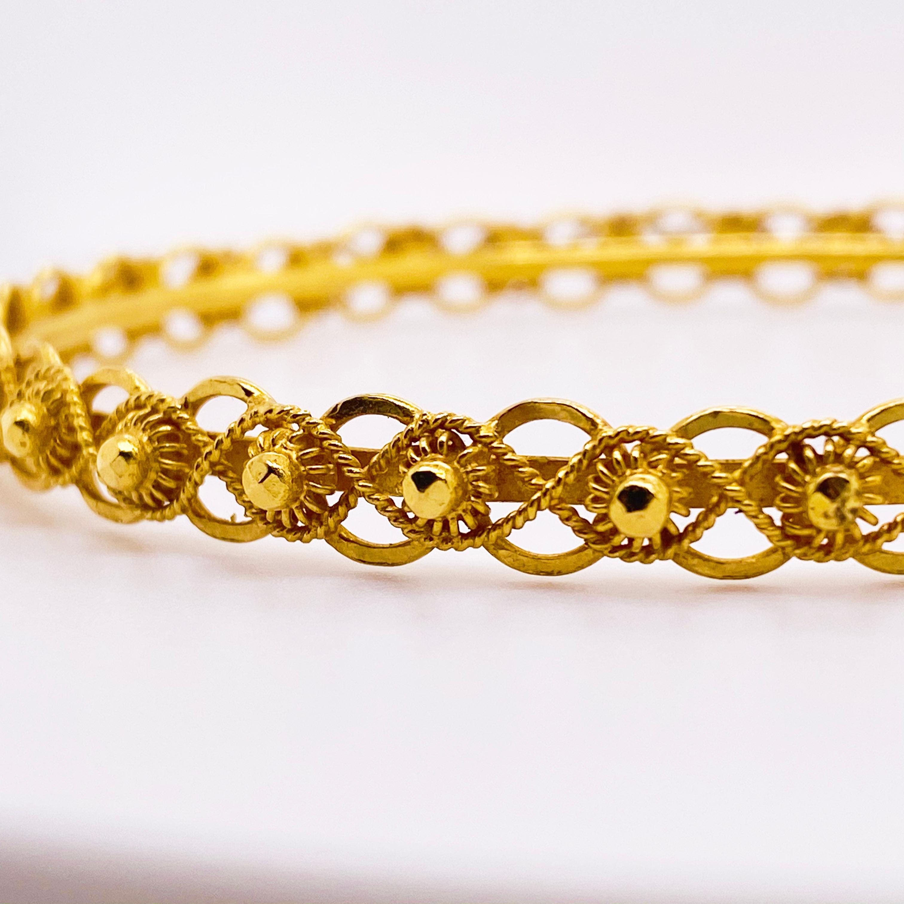 21 karat yellow gold bangle bracelet! The bracelet has a beaded design with twisted accents. It is a fine jewelry piece that will compliment you on every occasion! This bracelet would make the perfect gift for your loved one or yourself!

The