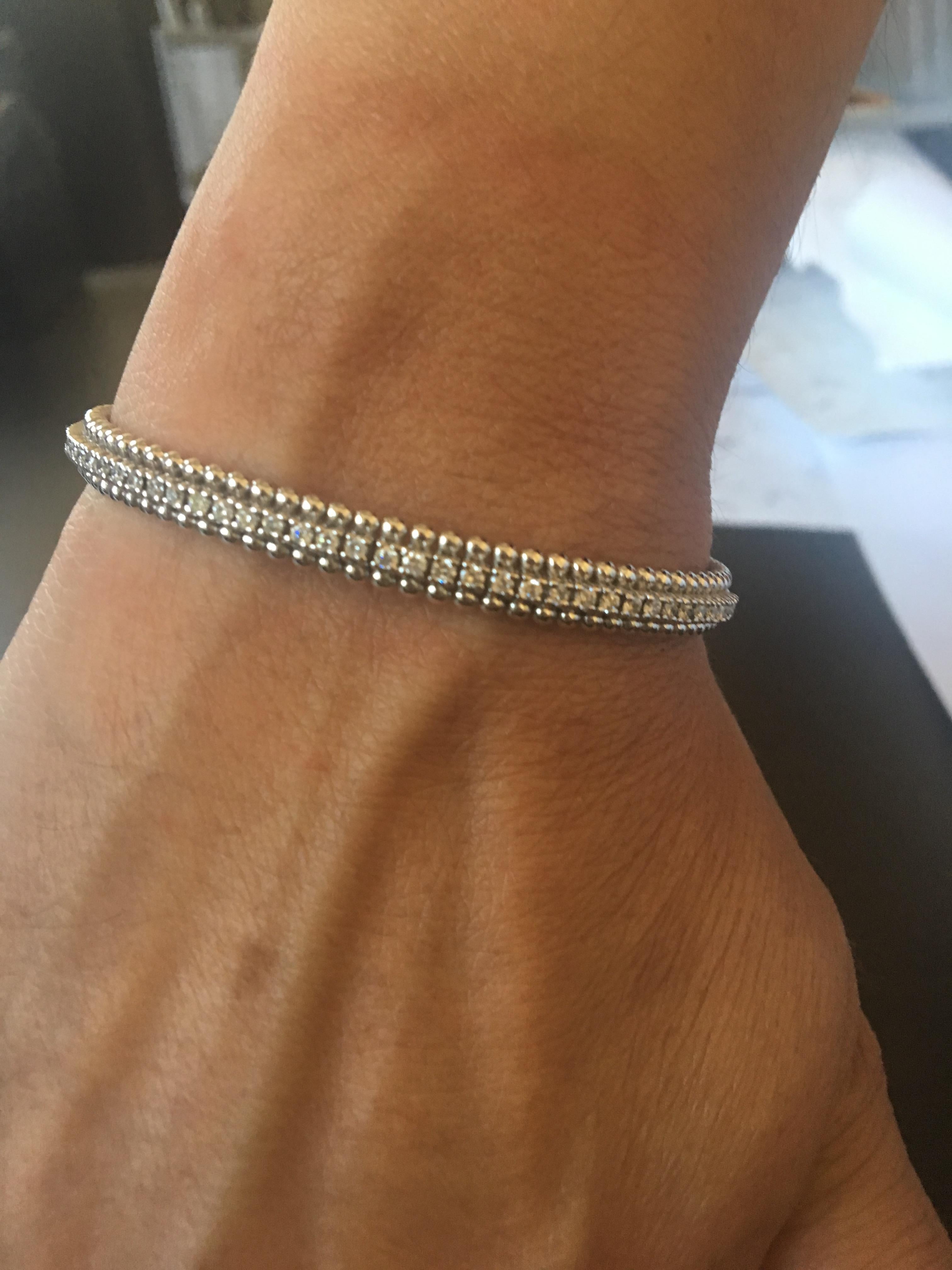 These Diamond Bangles are sold individually or as a set. They are a classic but fashion-forward piece. Made in Italy 18 Karat White Gold, 0.82 Carat wt each,  Color G, Clarity SI. Each bangle is made like a flexible cuff and is $2500 each. 