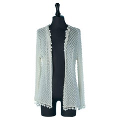 Beaded edge to edge jacket with pearl on a tulle base Circa 1960
s