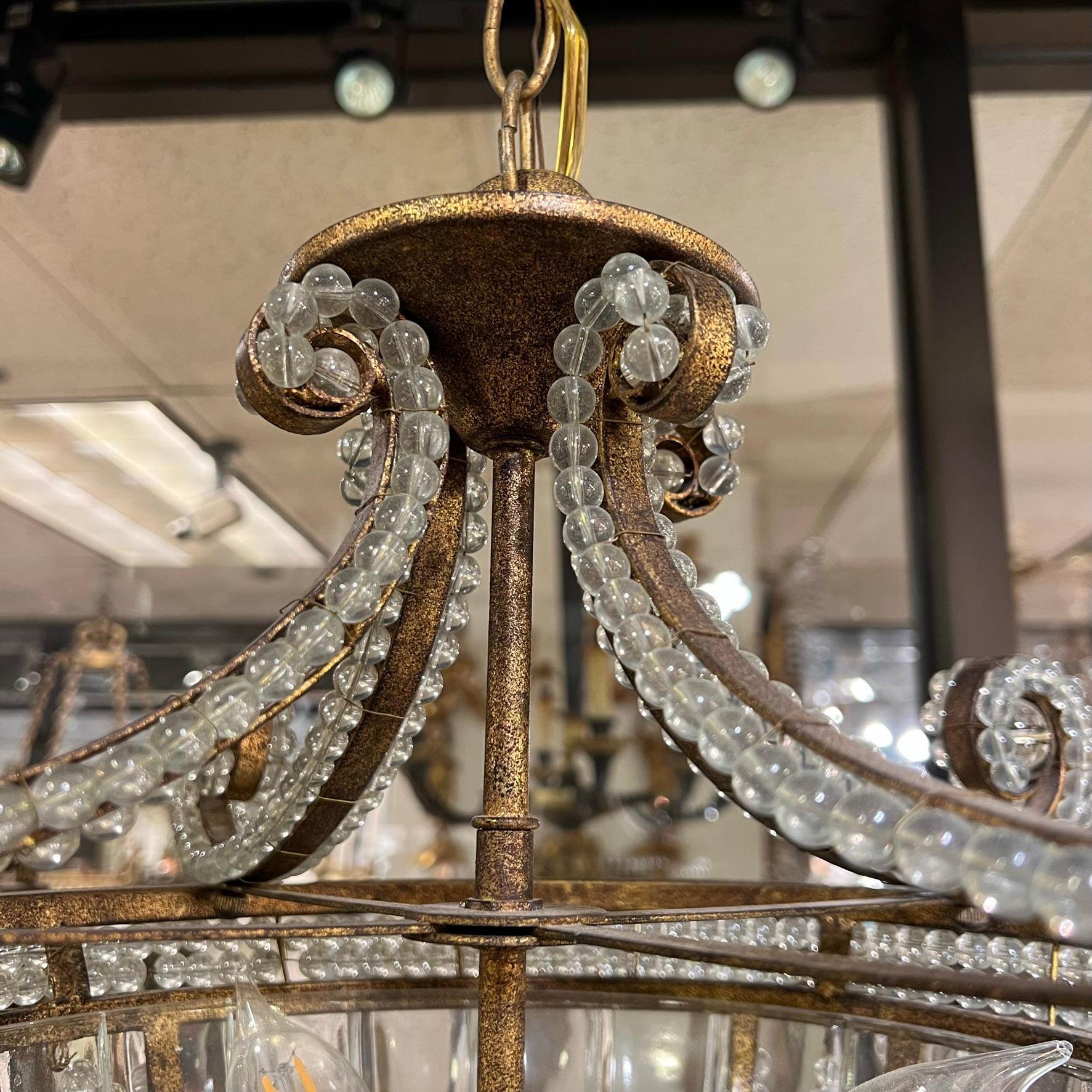 Metal Beaded Glass and Bronze Chandelier For Sale