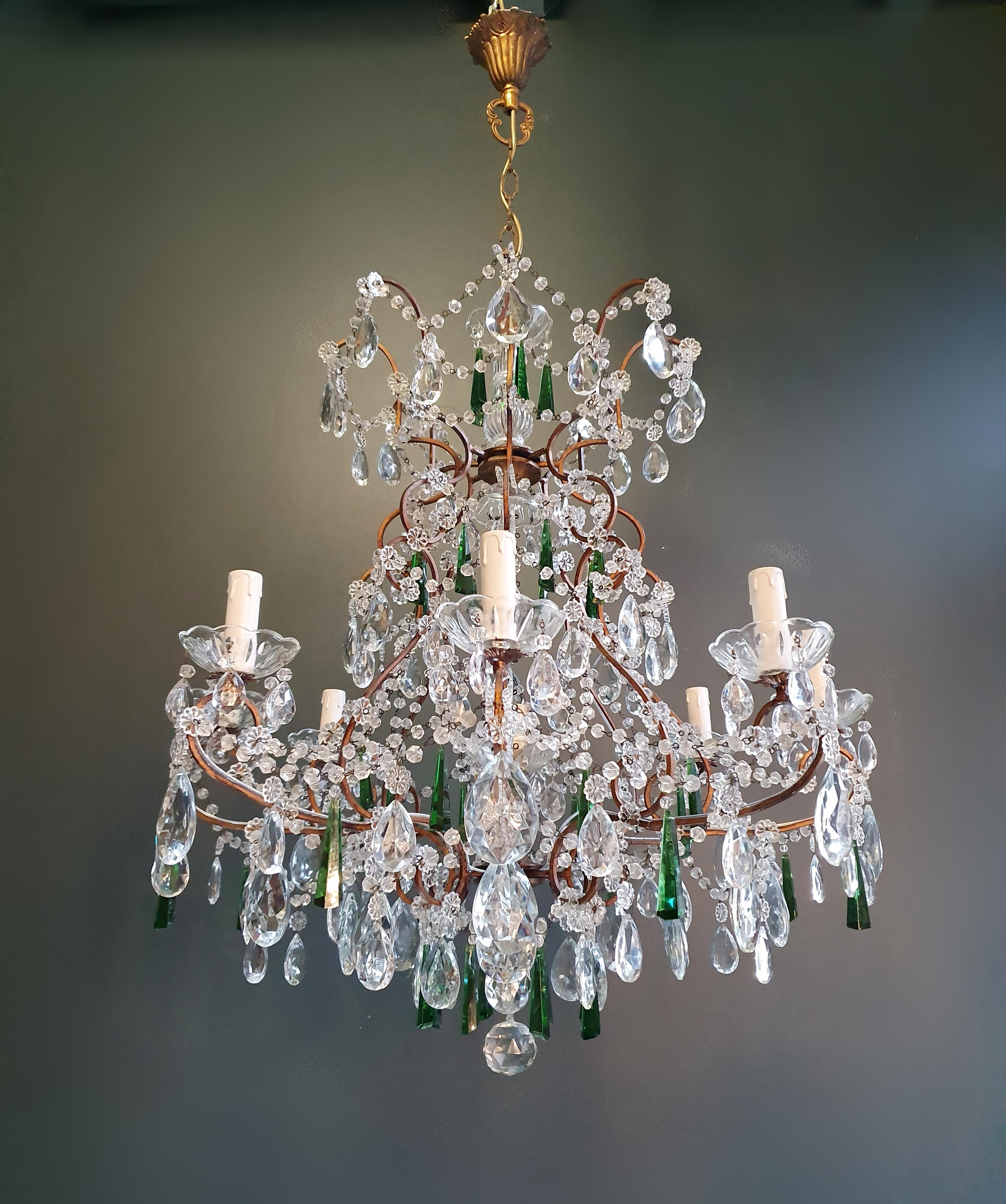 old chandelier with love and professionally restored in Berlin. electrical wiring works in the US.
Re-wired and ready to hang
not one missing
Cabling completely renewed. Crystal, hand-knotted.

Measures: Total height 130 cm, height without chain 80