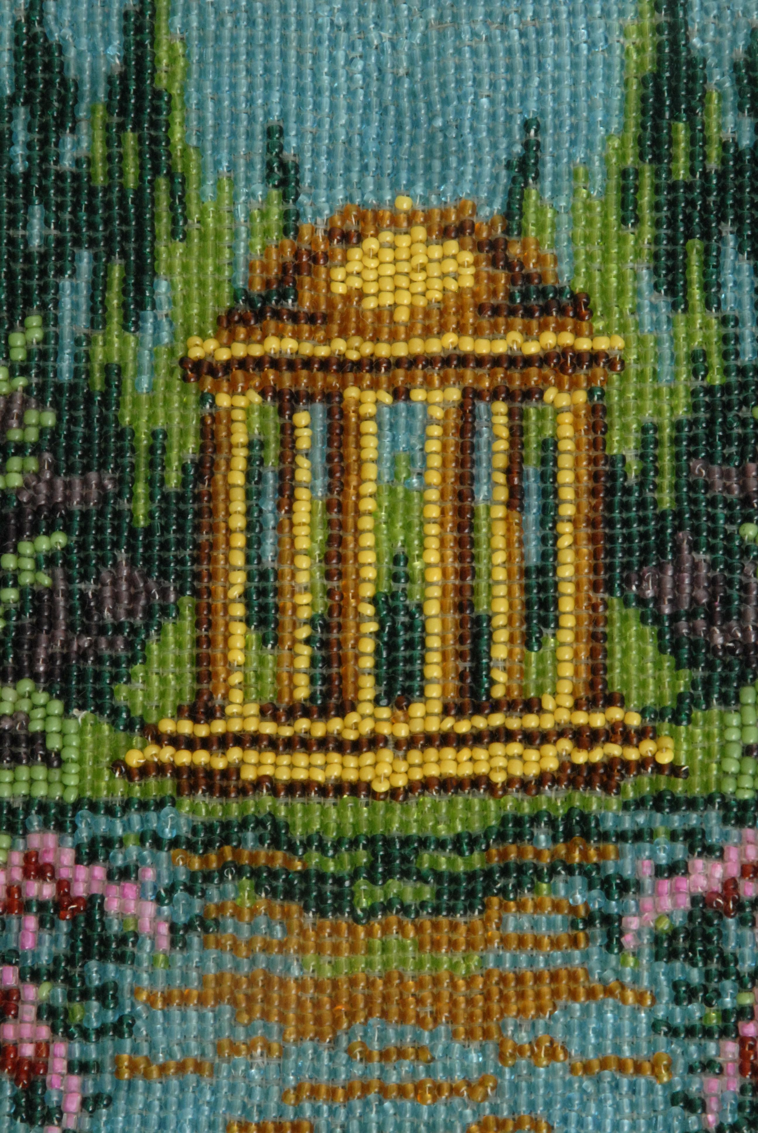 Bright and clear beaded bag of a Classical Rotunda set on the edge of a lake edged with flowering trees on either side against of duck egg blue sky.
In superb condition with perhaps 2 or 3 of the small glass beads missing out of a total of