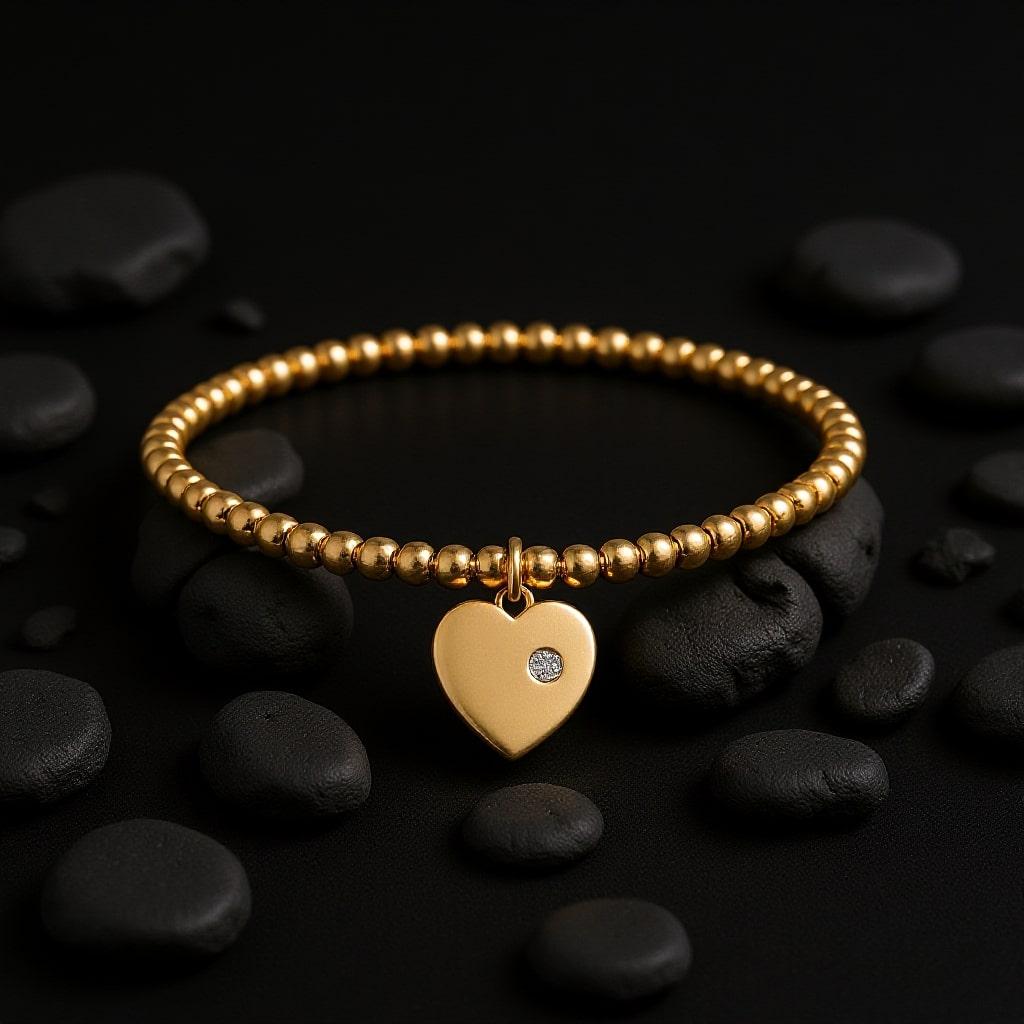 Delicada y llena de encanto, la Pulsera Corazón de Cuentas 14K (o 18K bajo pedido) con Encanto y Acento de Diamantes es la expresión perfecta de la elegancia atemporal. Elaborada con cuentas de oro macizo, esta pulsera presenta un charm de corazón
