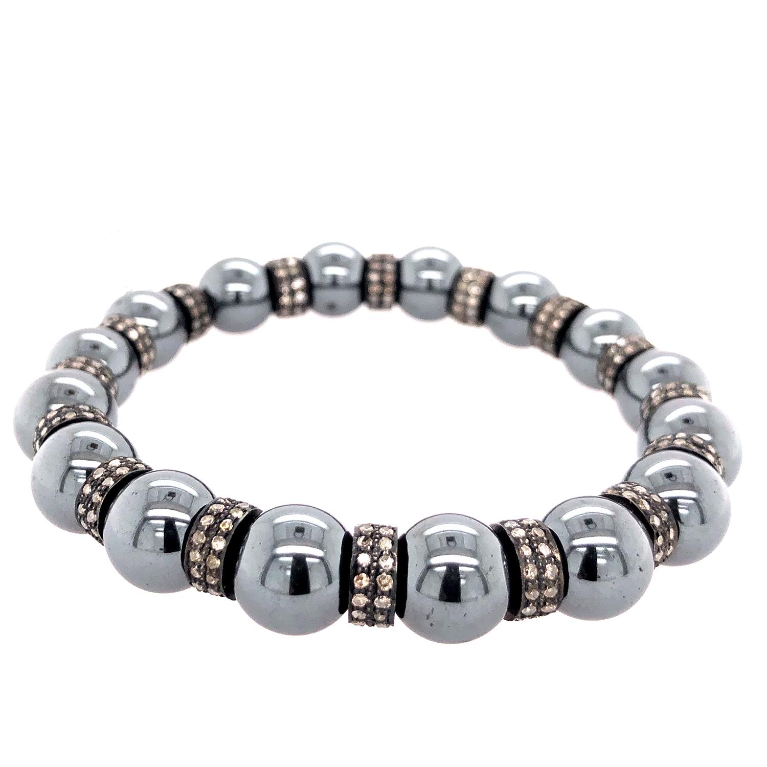 Cool and great to stack this season beaded Hematite and Diamond Stretchable Bracelet in silver is lovely and easy to wear.

Silver: 4.55gms
Diamond: 1.95cts
