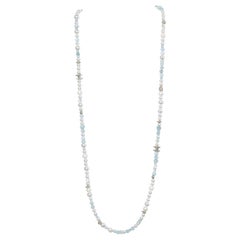 Beaded long neckless with pearls and silver beads "CC" Chanel Beaded long neckless with pearls and silver beads "CC" Chanel