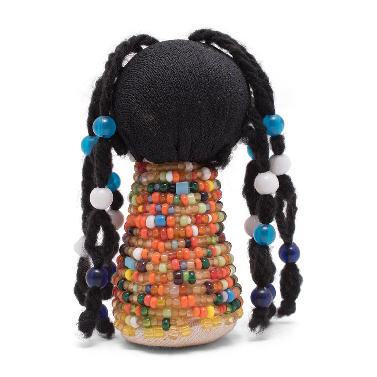 A rare imported commodity, glass beads have been a symbol of wealth and importance in south African cultures for centuries, and were exclusively distributed by the region's leader. As beads become gradually more accessible throughout the 19th